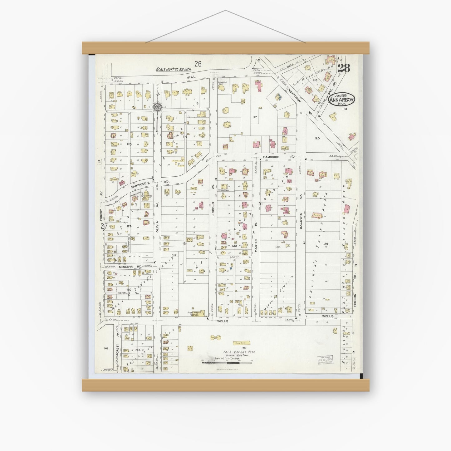 Old map wall art mockup — magnetic wood frame on white wall — Sanborn Fire Insurance Map from Ann Arbor, Washtenaw County, Michigan (1916), Sheet #0028