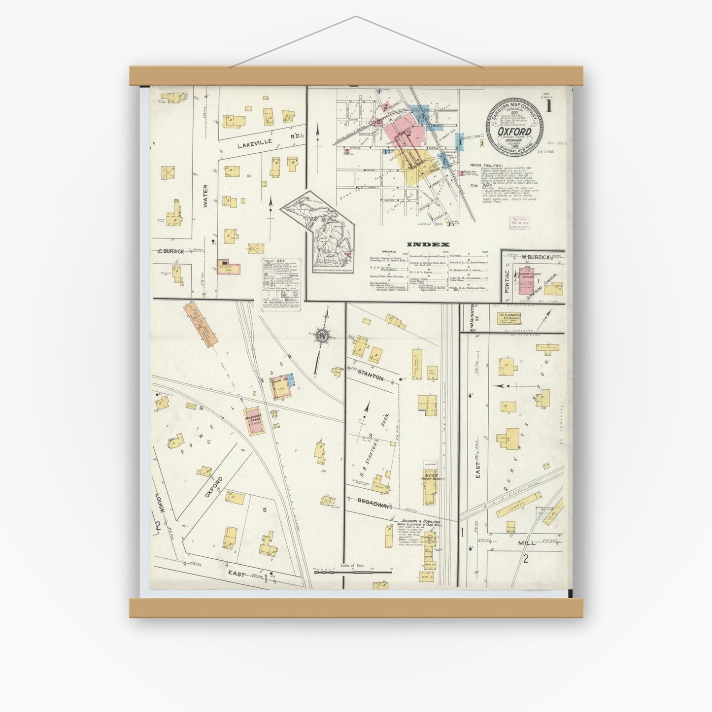 Old map wall art mockup — magnetic wood frame on white wall — Sanborn Fire Insurance Map from Oxford, Oakland County, Michigan (1915) - Complete Map Set