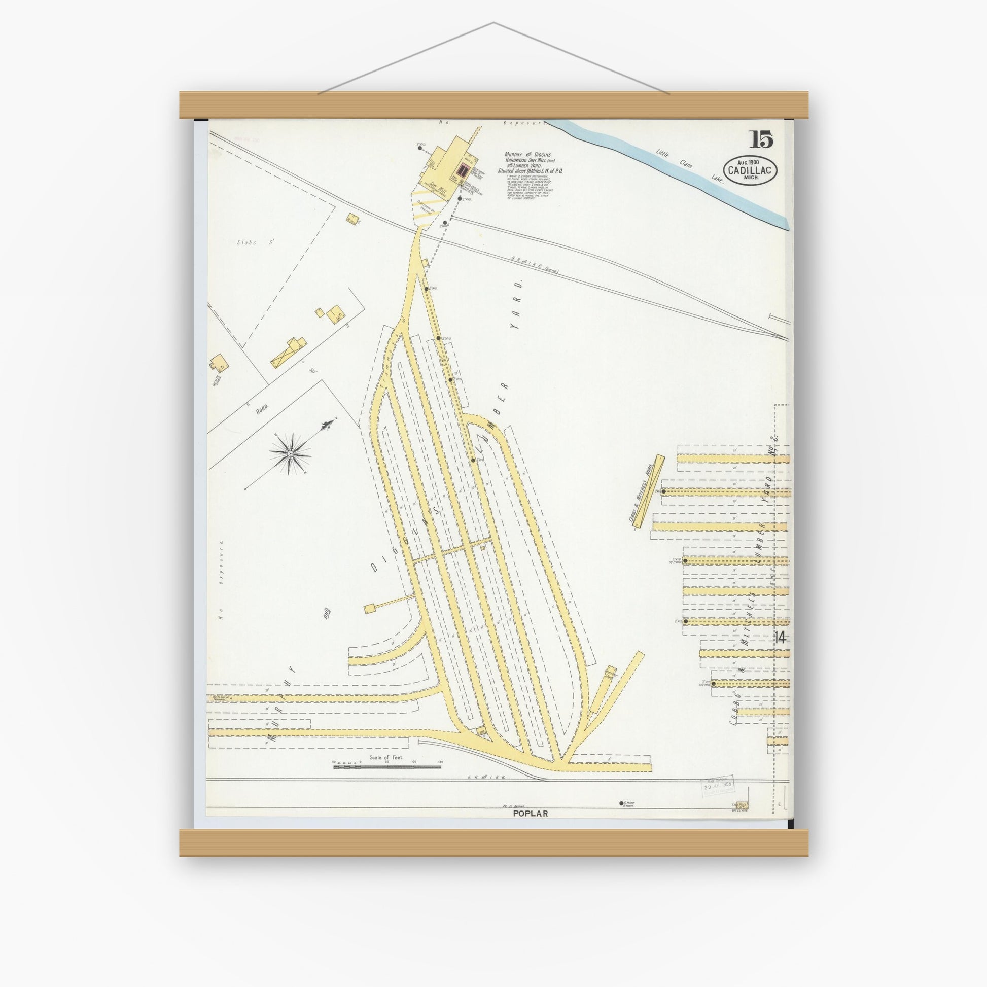 Old map wall art mockup — magnetic wood frame on white wall — Sanborn Fire Insurance Map from Cadillac, Wexford County, Michigan (1900), Sheet #0015