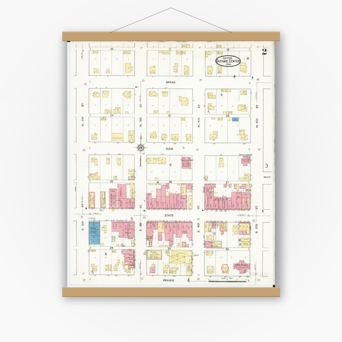 Old map wall art mockup — magnetic wood frame on white wall — Sanborn Fire Insurance Map from Guthrie Center, Guthrie County, Iowa (1916), Sheet #0002