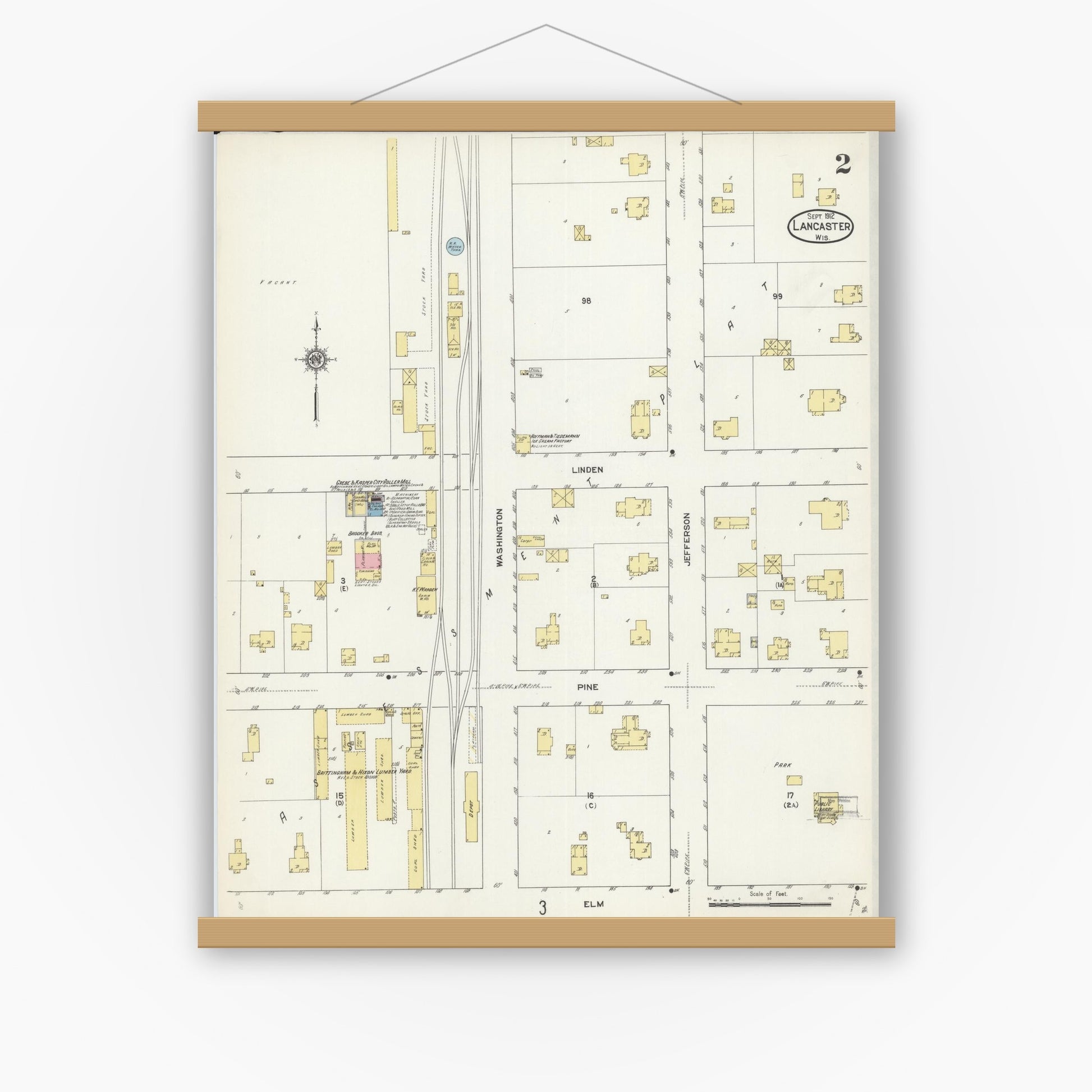 Old map wall art mockup — magnetic wood frame on white wall — Sanborn Fire Insurance Map from Lancaster, Grant County, Wisconsin (1912), Sheet #0002