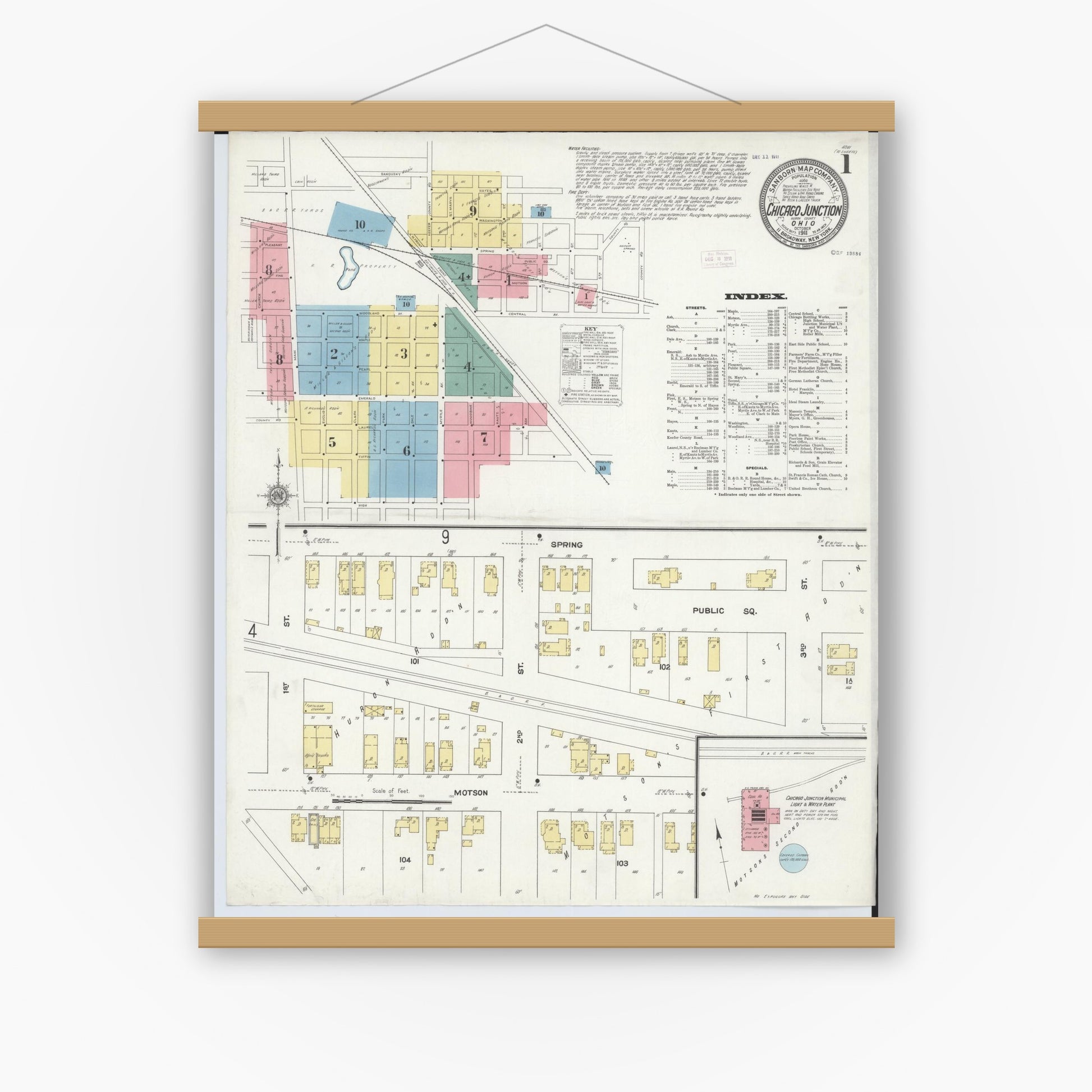 Old map wall art mockup — magnetic wood frame on white wall — Sanborn Fire Insurance Map from Chicago Junction, Huron County, Ohio (1911), Sheet #0001