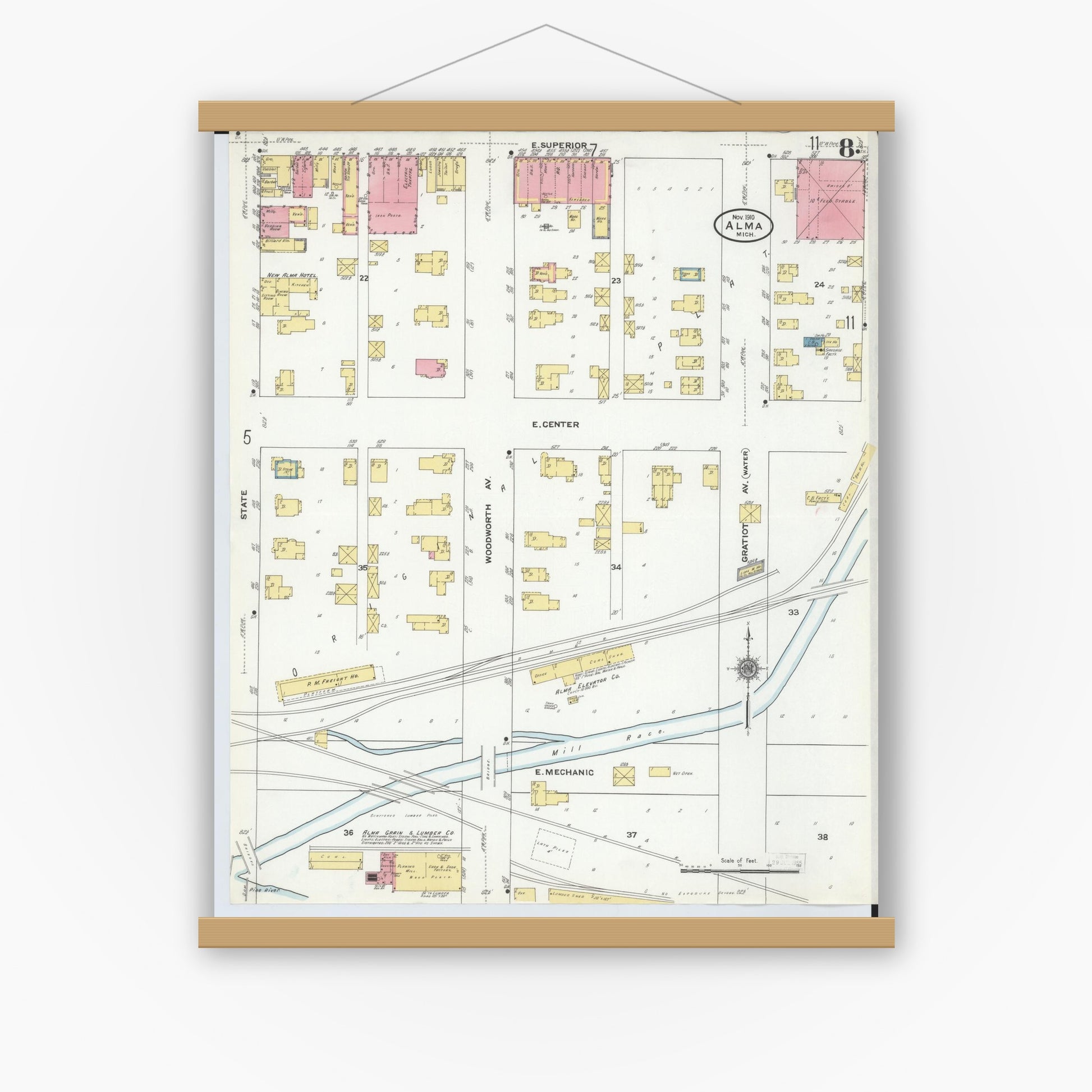 Old map wall art mockup — magnetic wood frame on white wall — Sanborn Fire Insurance Map from Alma, Gratiot County, Michigan (1910), Sheet #0008