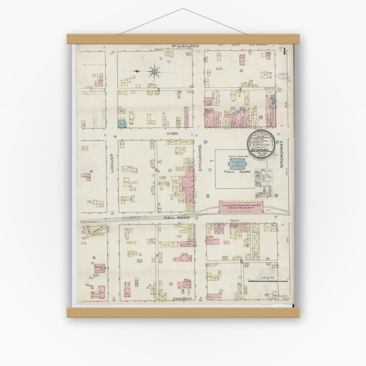 Old map wall art mockup — magnetic wood frame on white wall — Sanborn Fire Insurance Map from Bedford, Lawrence County, Indiana (1886) - Complete Map Set