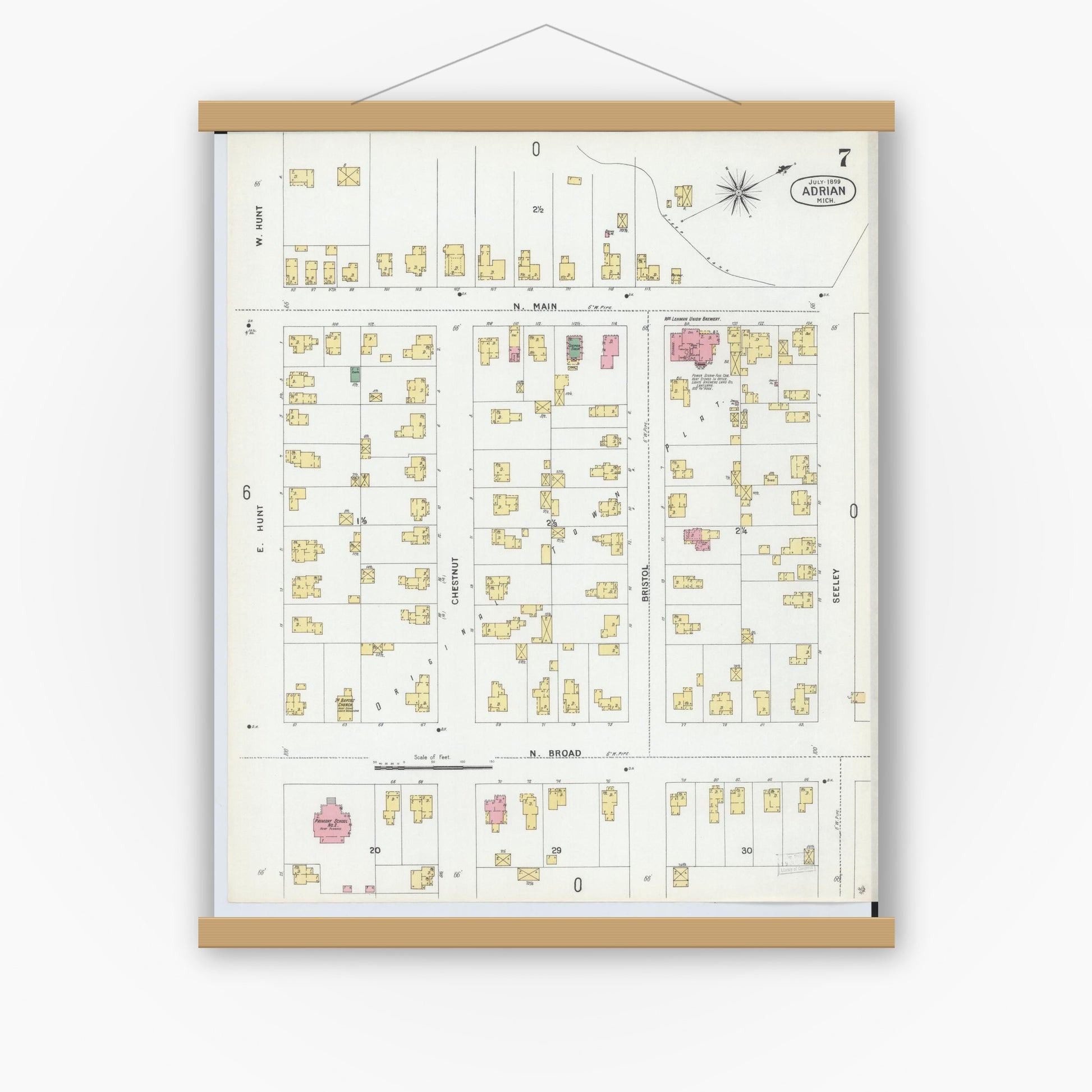 Old map wall art mockup — magnetic wood frame on white wall — Sanborn Fire Insurance Map from Adrian, Lenawee County, Michigan (1899), Sheet #0007