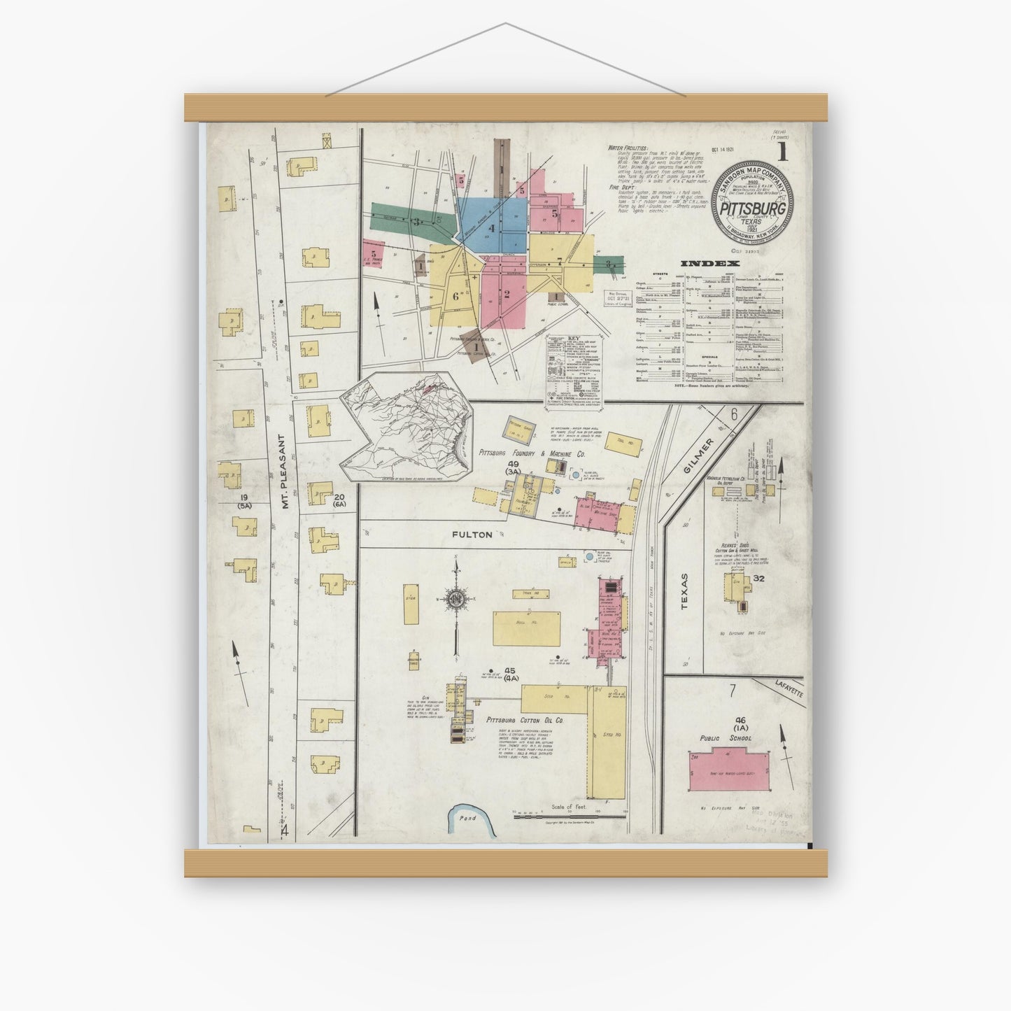 Old map wall art mockup — magnetic wood frame on white wall — Sanborn Fire Insurance Map from Pittsburg, Camp County, Texas (1921) - Complete Map Set