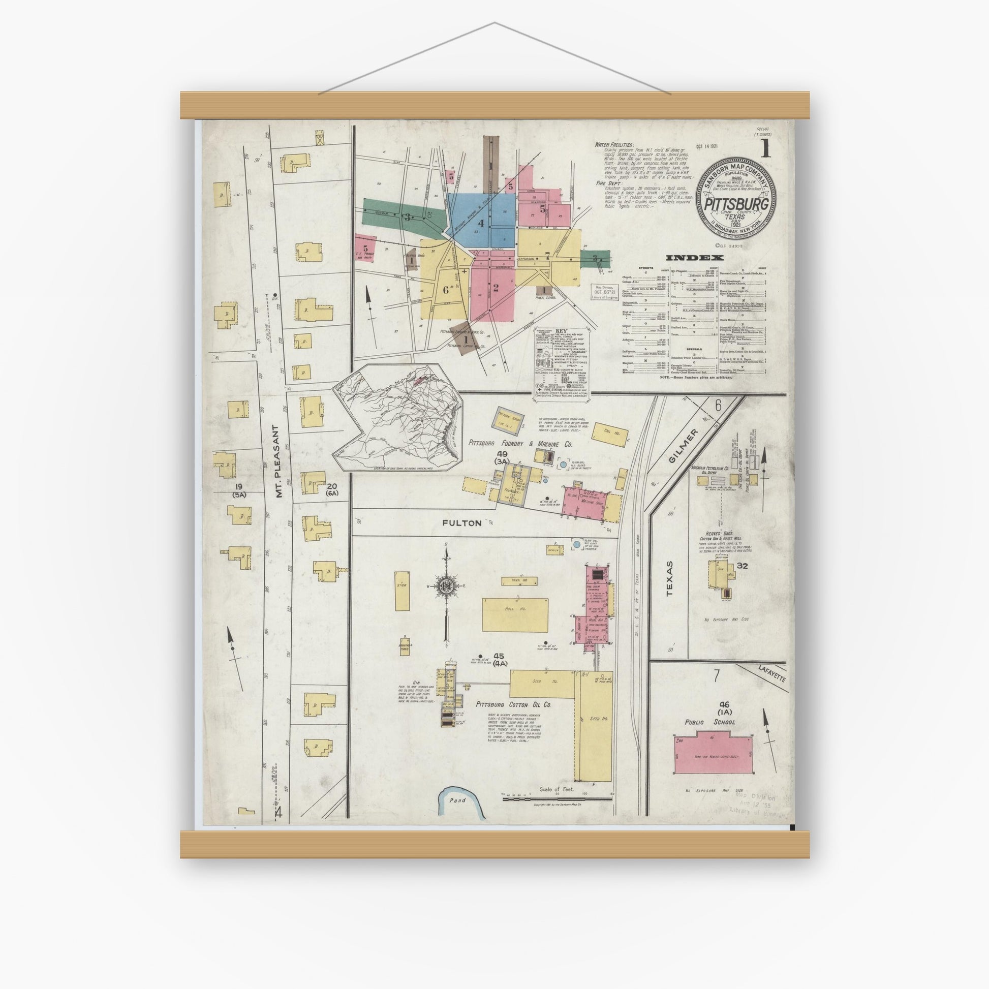 Old map wall art mockup — magnetic wood frame on white wall — Sanborn Fire Insurance Map from Pittsburg, Camp County, Texas (1921) - Complete Map Set