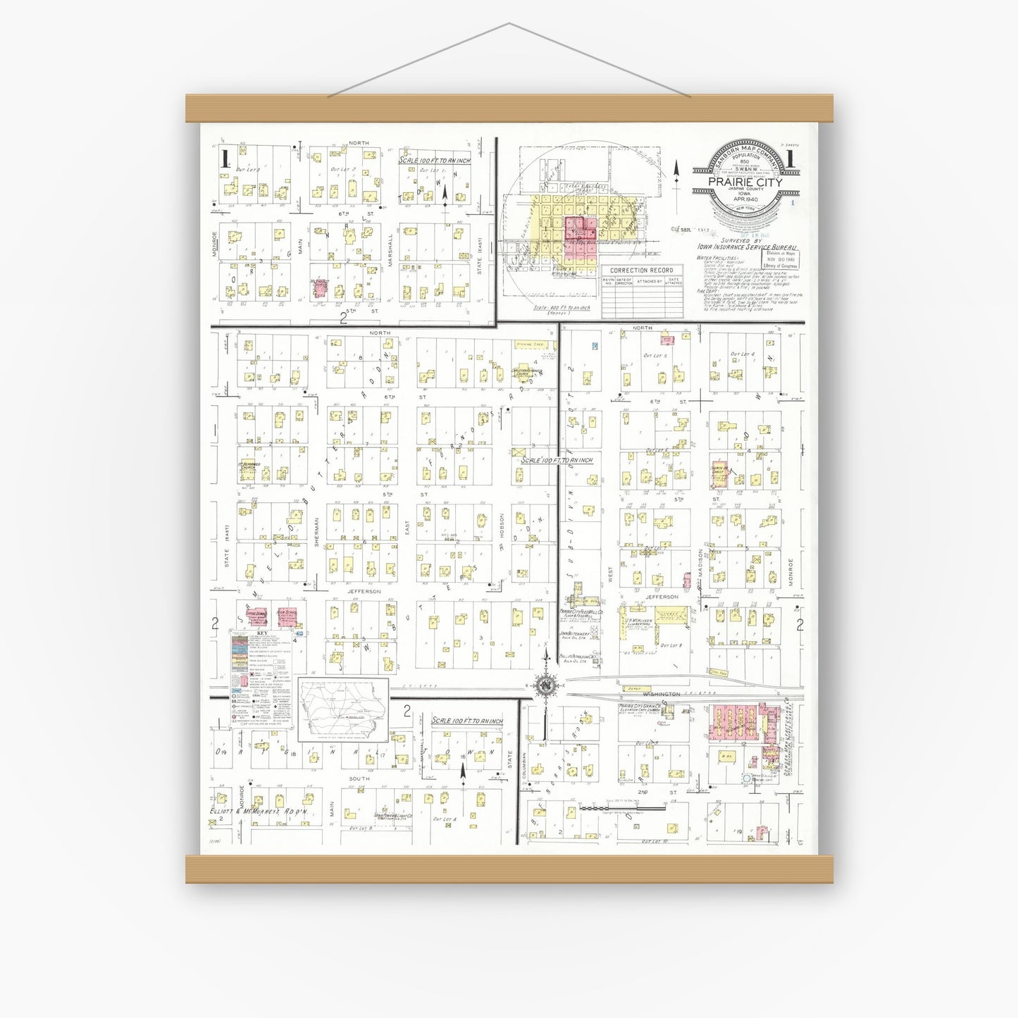 Old map wall art mockup — magnetic wood frame on white wall — Sanborn Fire Insurance Map from Prairie City, Jasper County, Iowa (1940), Sheet #0001