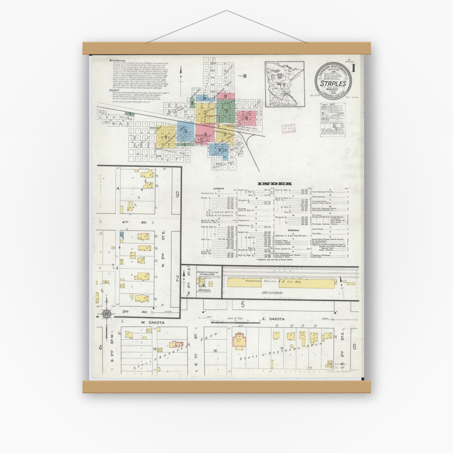 Old map wall art mockup — magnetic wood frame on white wall — Sanborn Fire Insurance Map from Staples, Todd County, Minnesota (1916) - Complete Map Set