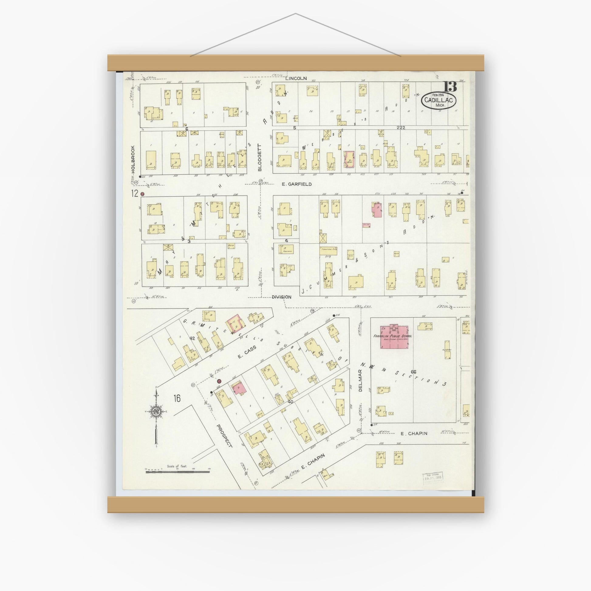 Old map wall art mockup — magnetic wood frame on white wall — Sanborn Fire Insurance Map from Cadillac, Wexford County, Michigan (1914), Sheet #0013