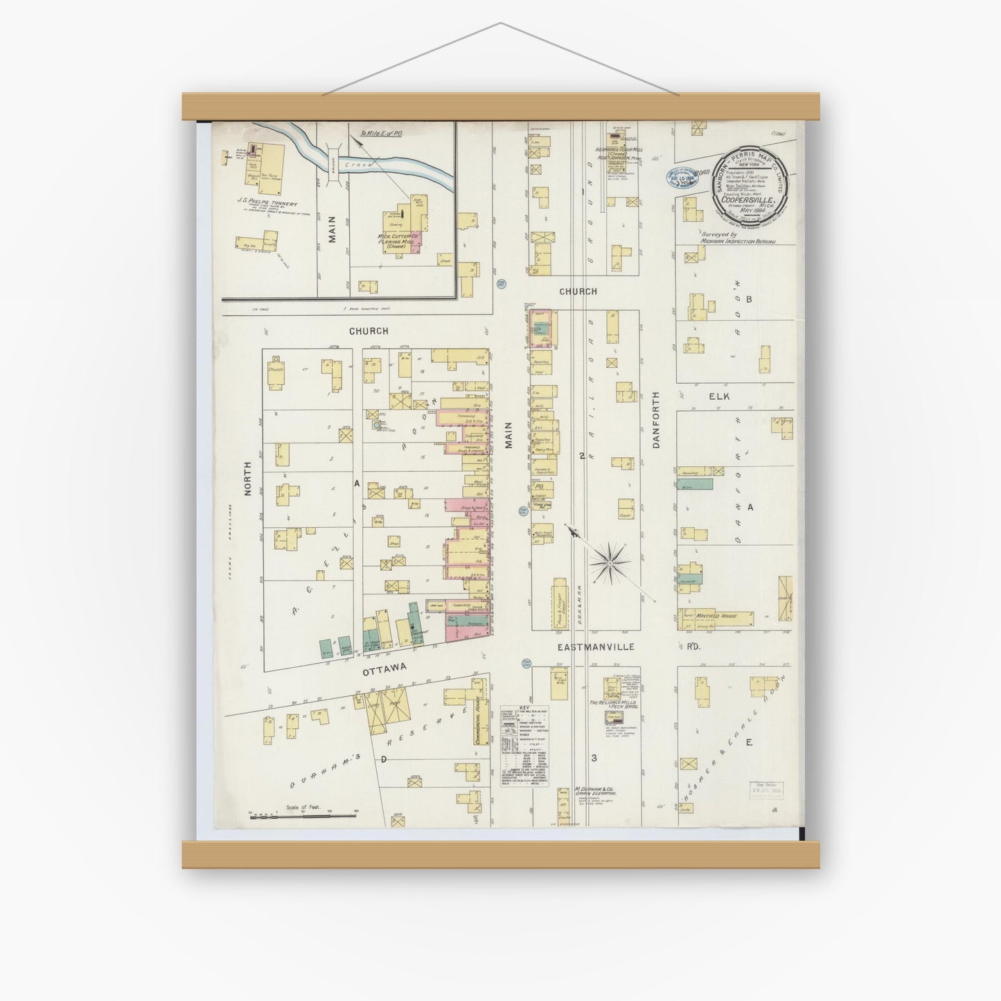 Old map wall art mockup — magnetic wood frame on white wall — Sanborn Fire Insurance Map from Coopersville, Ottawa County, Michigan (1894), Sheet #0001