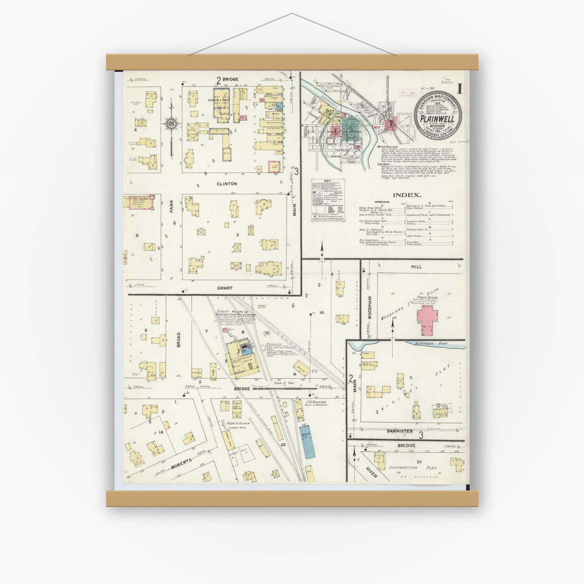 Old map wall art mockup — magnetic wood frame on white wall — Sanborn Fire Insurance Map from Plainwell, Allegan County, Michigan (1911), Sheet #0001