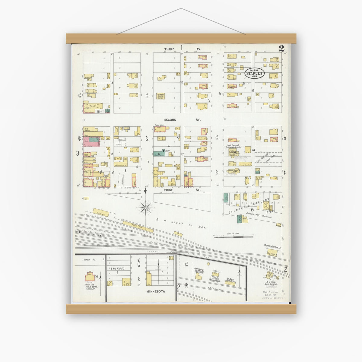 Old map wall art mockup — magnetic wood frame on white wall — Sanborn Fire Insurance Map from Staples, Todd County, Minnesota (1899), Sheet #0002