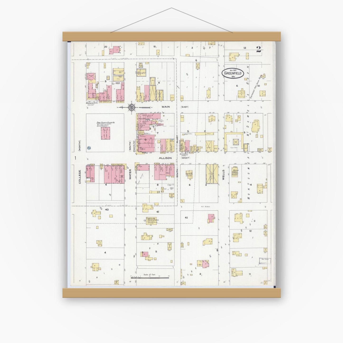 Old map wall art mockup — magnetic wood frame on white wall — Sanborn Fire Insurance Map from Greenfield, Dade County, Missouri (1910), Sheet #0002