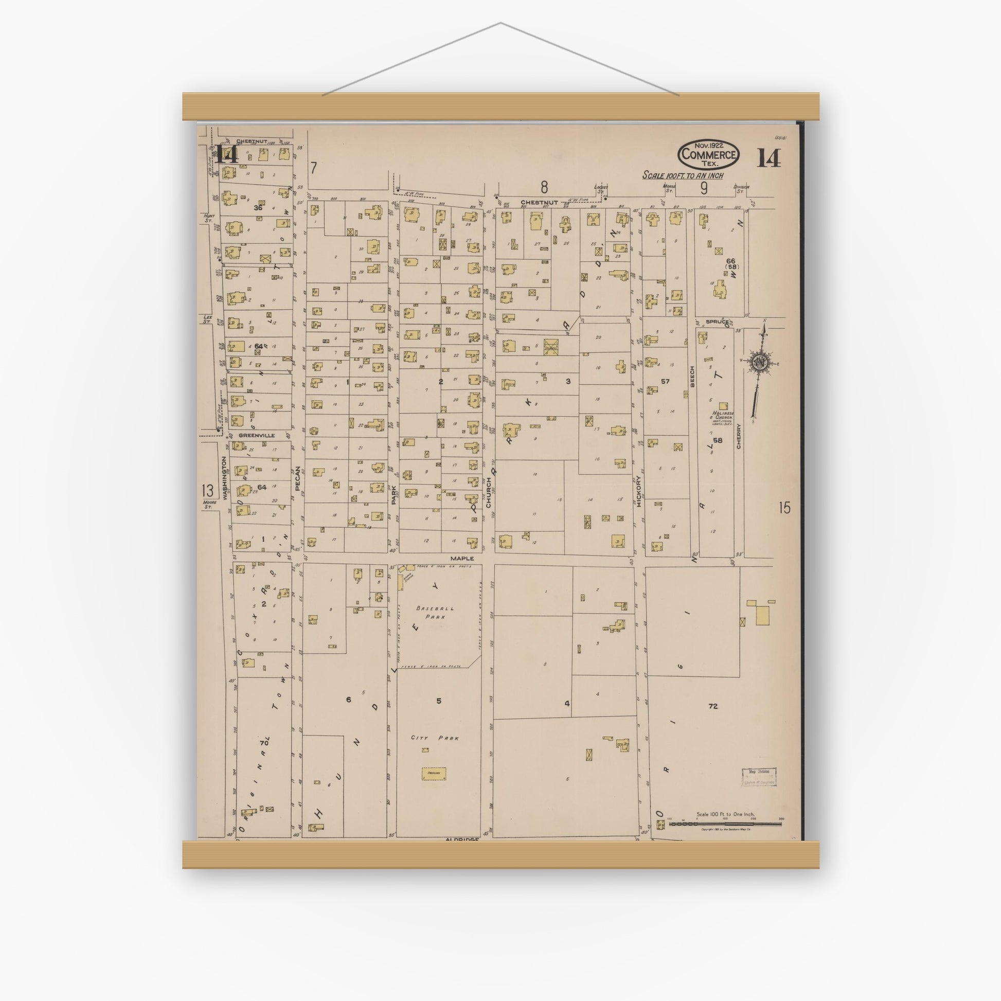 Old map wall art mockup — magnetic wood frame on white wall — Sanborn Fire Insurance Map from Commerce, Hunt County, Texas (1922), Sheet #0014