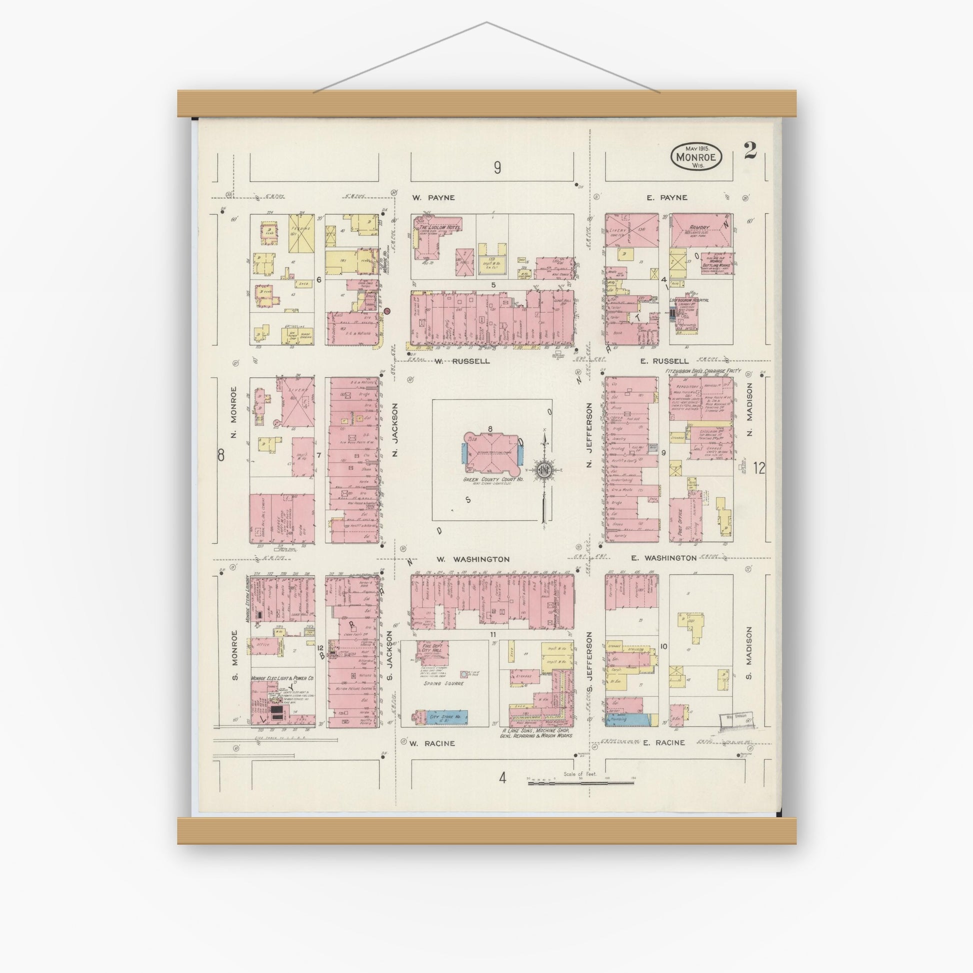 Old map wall art mockup — magnetic wood frame on white wall — Sanborn Fire Insurance Map from Monroe, Green County, Wisconsin (1915), Sheet #0002