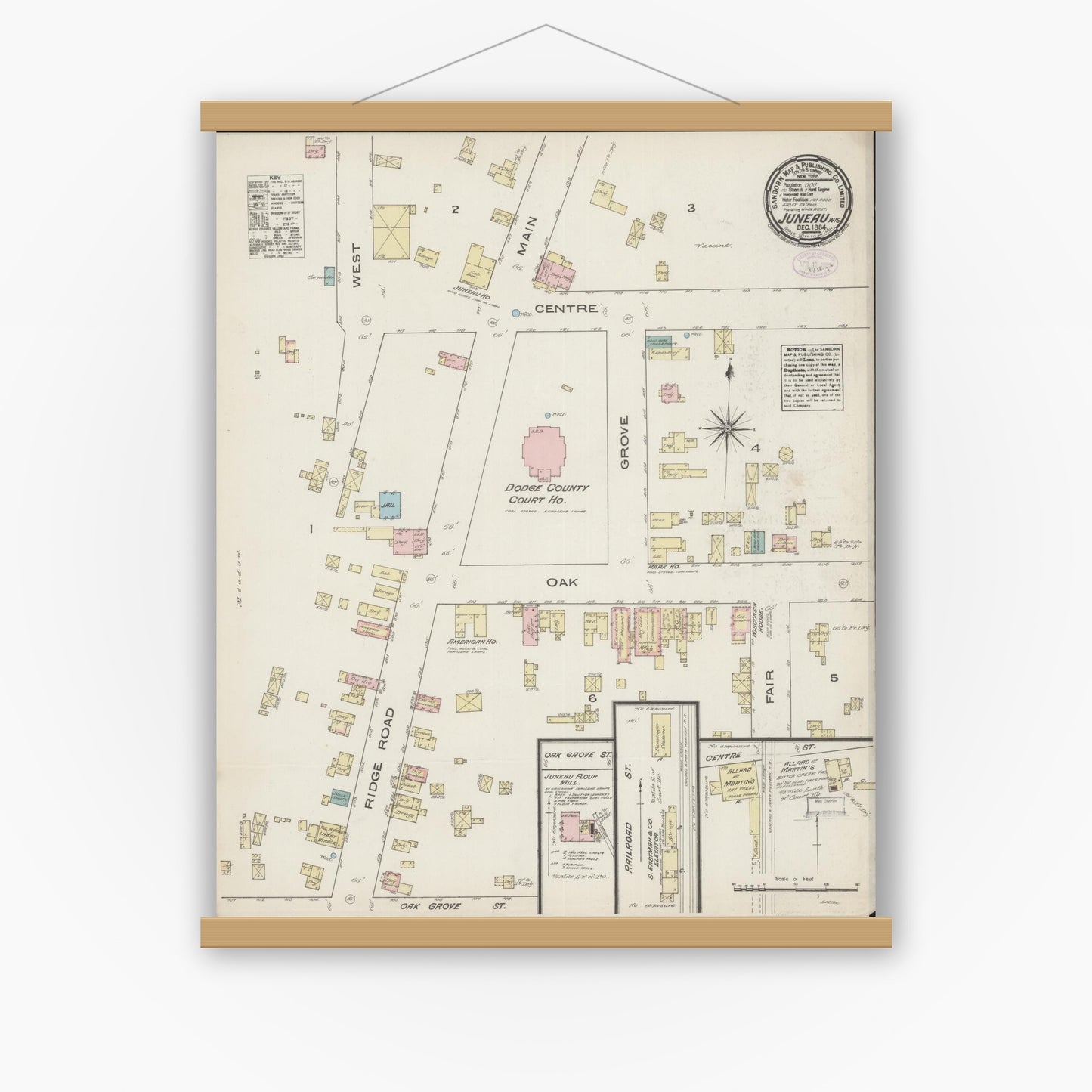 Old map wall art mockup — magnetic wood frame on white wall — Sanborn Fire Insurance Map from Juneau, Dodge County, Wisconsin (1884), Sheet #0001