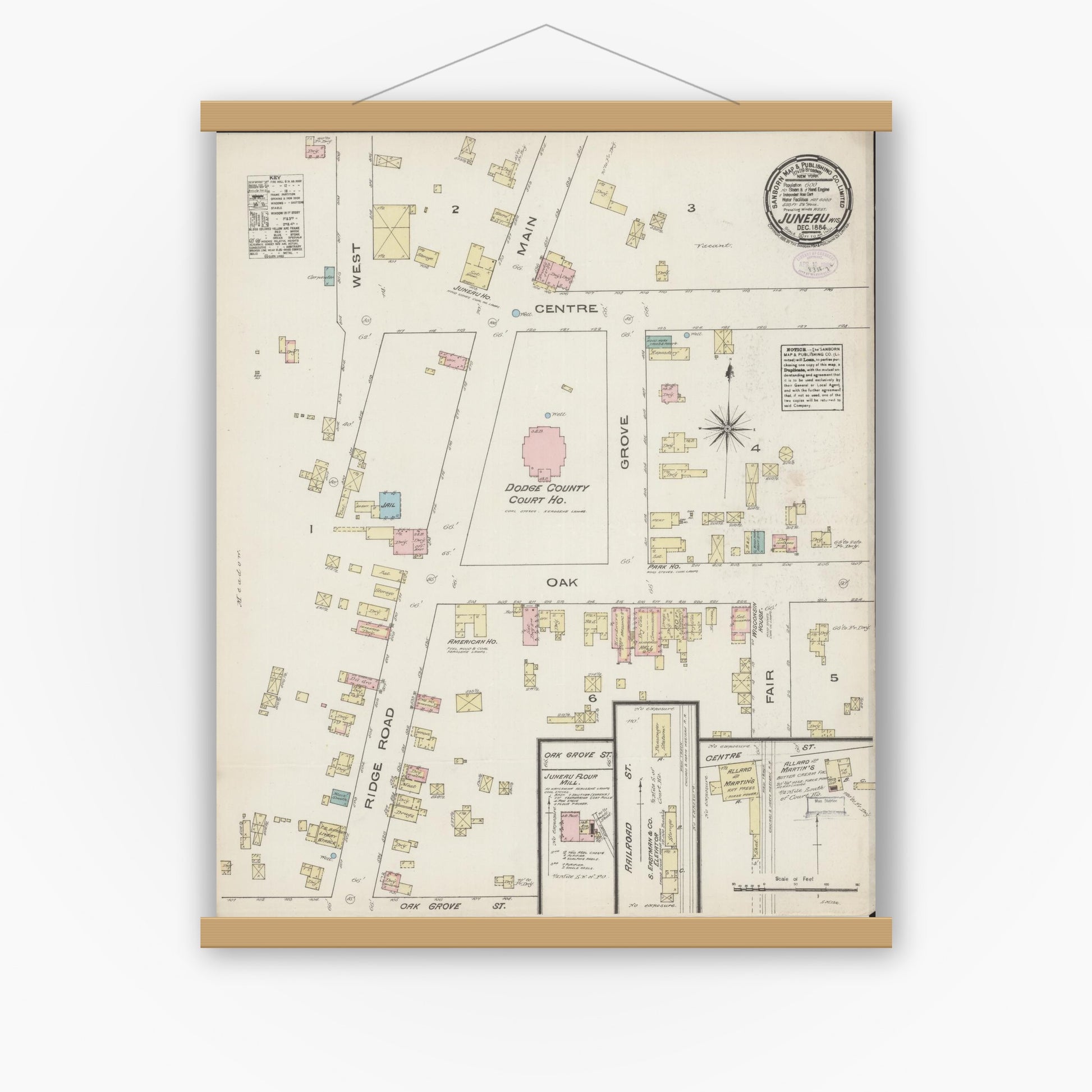 Old map wall art mockup — magnetic wood frame on white wall — Sanborn Fire Insurance Map from Juneau, Dodge County, Wisconsin (1884), Sheet #0001