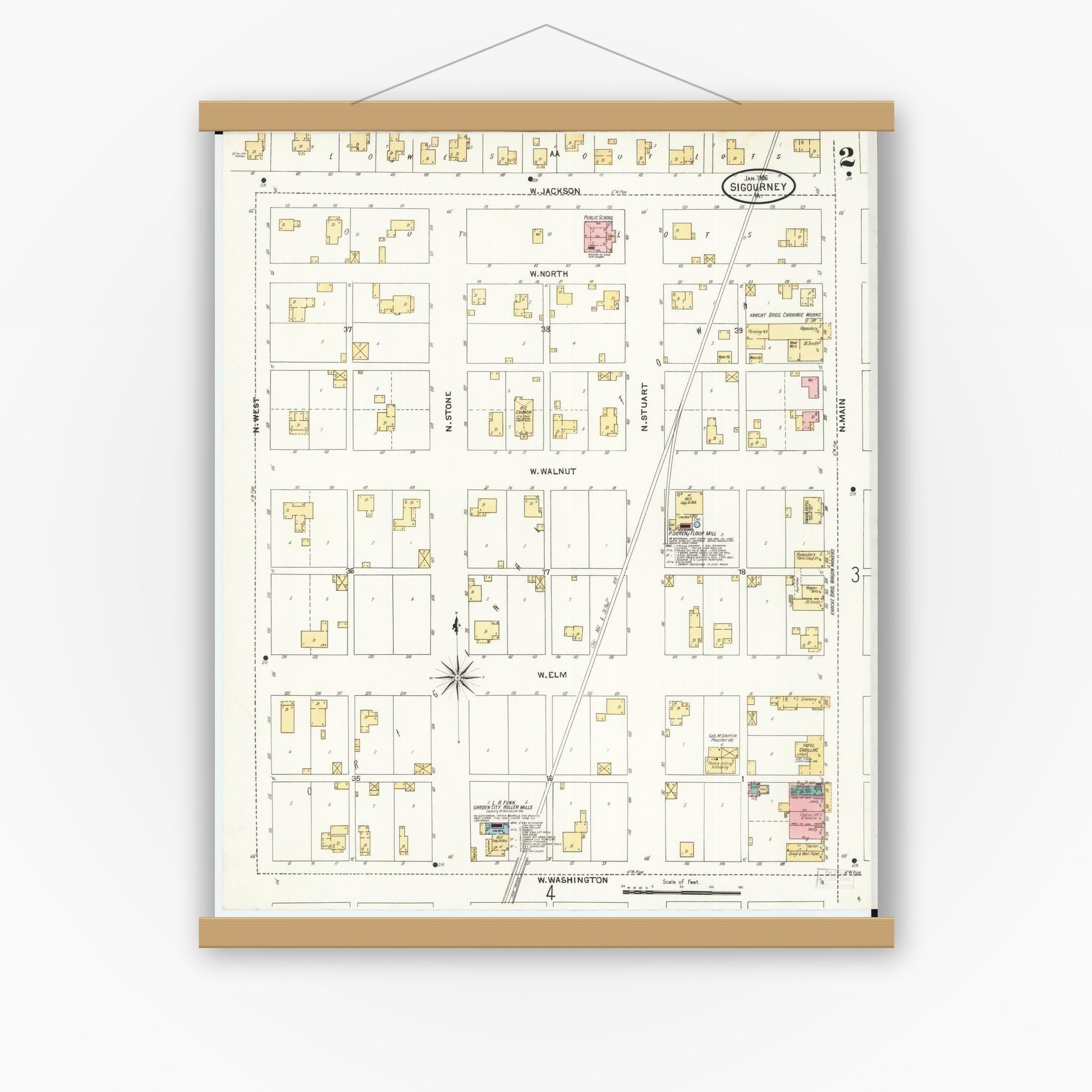 Old map wall art mockup — magnetic wood frame on white wall — Sanborn Fire Insurance Map from Sigourney, Kiokuk County, Iowa (1906), Sheet #0002
