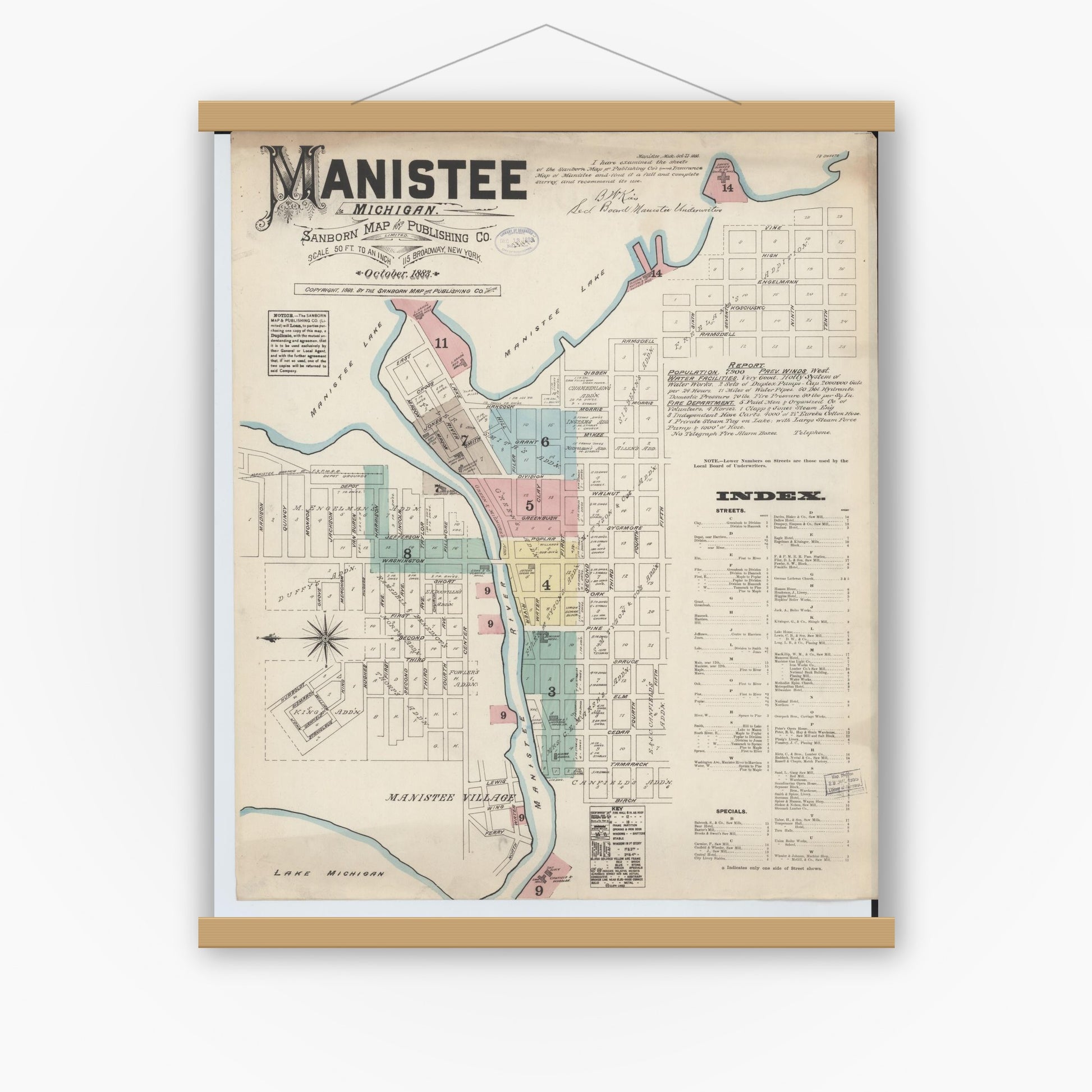 Old map wall art mockup — magnetic wood frame on white wall — Sanborn Fire Insurance Map from Manistee, Manistee County, Michigan (1883) - Complete Map Set