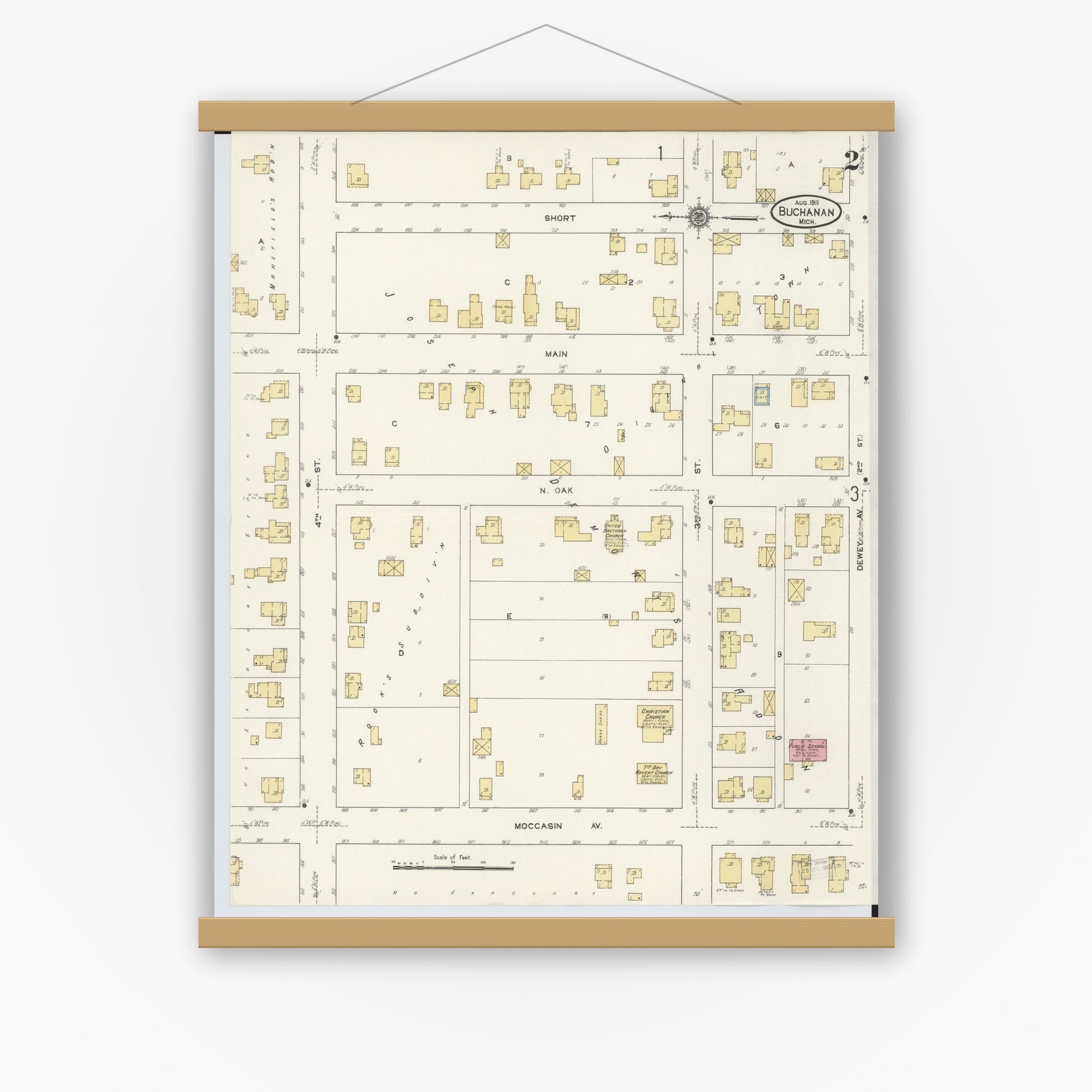 Old map wall art mockup — magnetic wood frame on white wall — Sanborn Fire Insurance Map from Buchanan, Berrien County, Michigan (1911), Sheet #0002