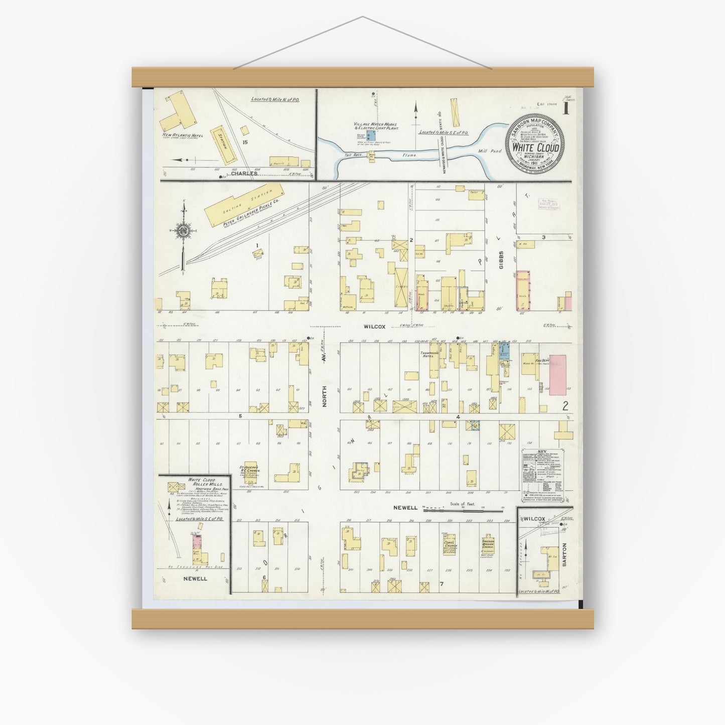 Old map wall art mockup — magnetic wood frame on white wall — Sanborn Fire Insurance Map from White Cloud, Newaygo County, Michigan (1911) - Complete Map Set