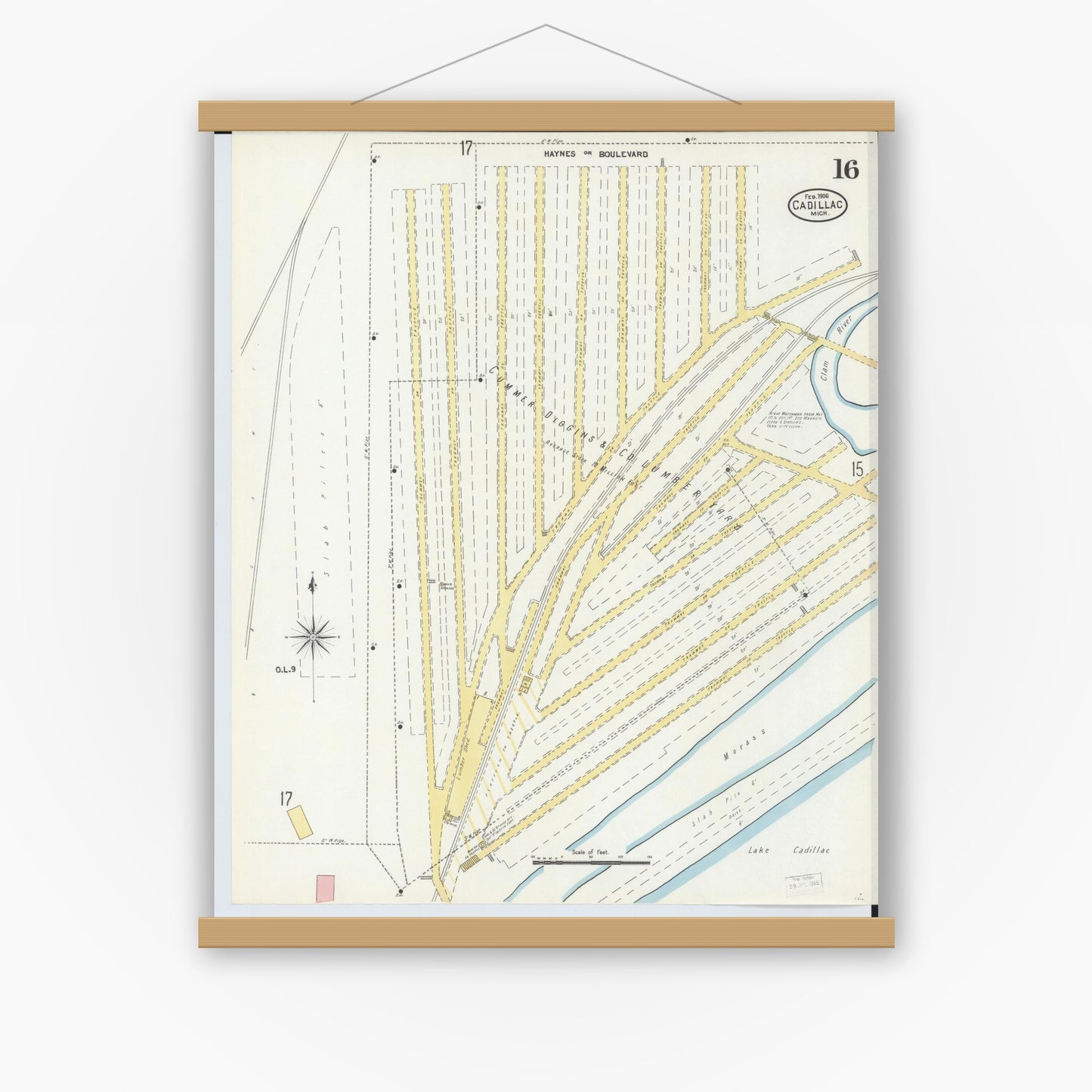 Old map wall art mockup — magnetic wood frame on white wall — Sanborn Fire Insurance Map from Cadillac, Wexford County, Michigan (1906), Sheet #0016