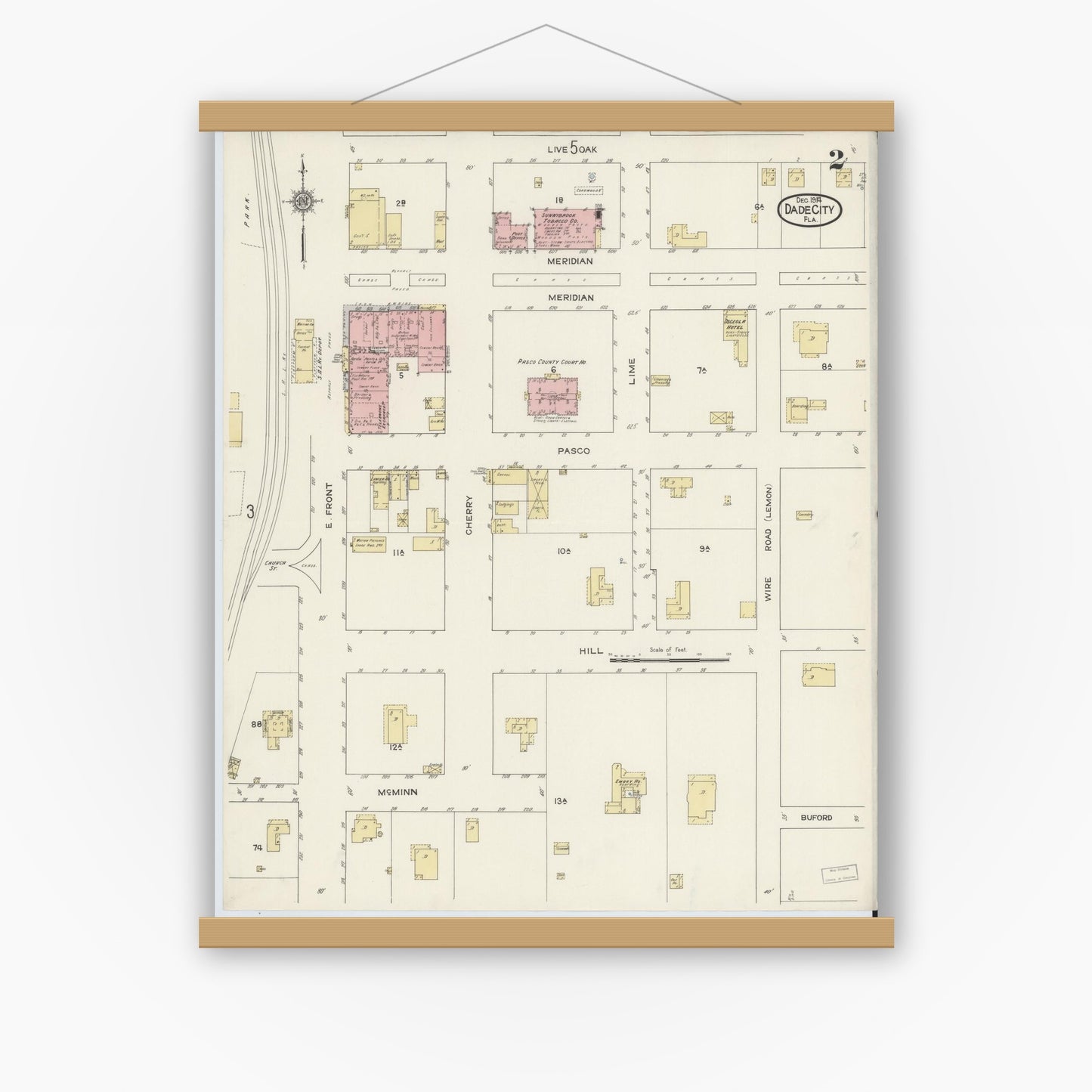 Old map wall art mockup — magnetic wood frame on white wall — Sanborn Fire Insurance Map from Dade City, Pasco County, Florida (1914), Sheet #0002