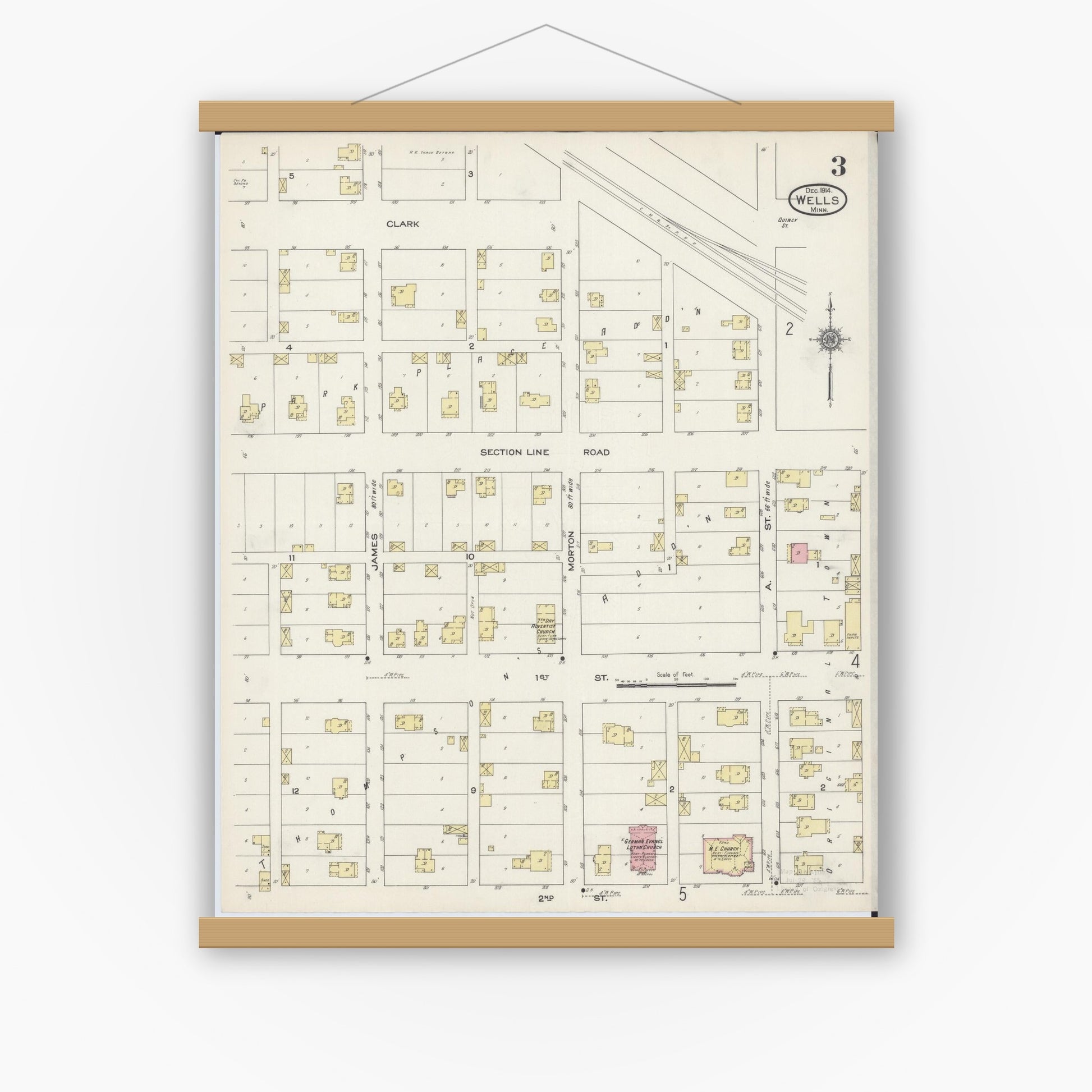 Old map wall art mockup — magnetic wood frame on white wall — Sanborn Fire Insurance Map from Wells, Faribault County, Minnesota (1914), Sheet #0003