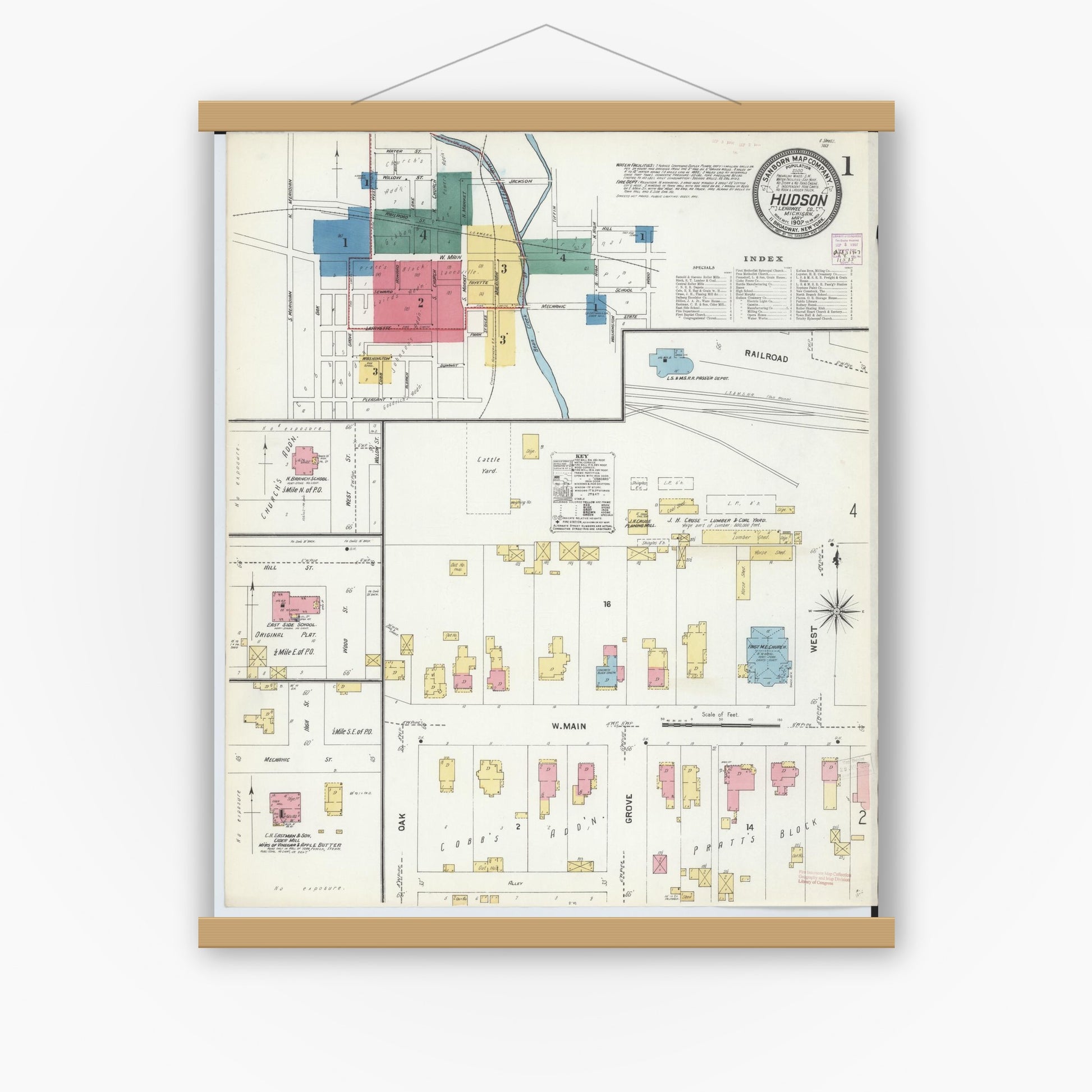 Old map wall art mockup — magnetic wood frame on white wall — Sanborn Fire Insurance Map from Hudson, Lenawee County, Michigan (1907) - Complete Map Set