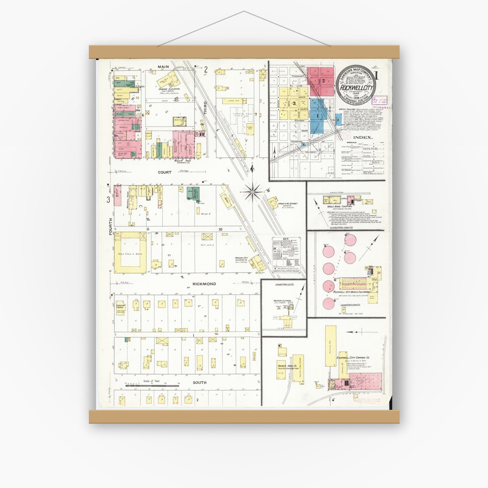 Old map wall art mockup — magnetic wood frame on white wall — Sanborn Fire Insurance Map from Rockwell City, Calhoun County, Iowa (1909) â€” Complete Set