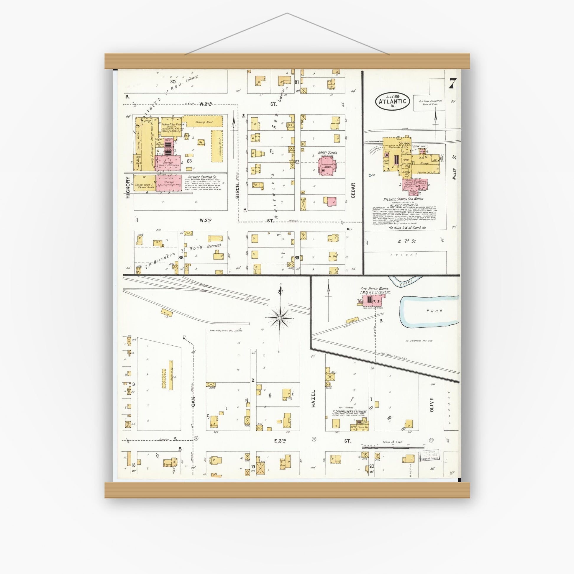 Old map wall art mockup — magnetic wood frame on white wall — Sanborn Fire Insurance Map from Atlantic, Cass County, Iowa (1899), Sheet #0007
