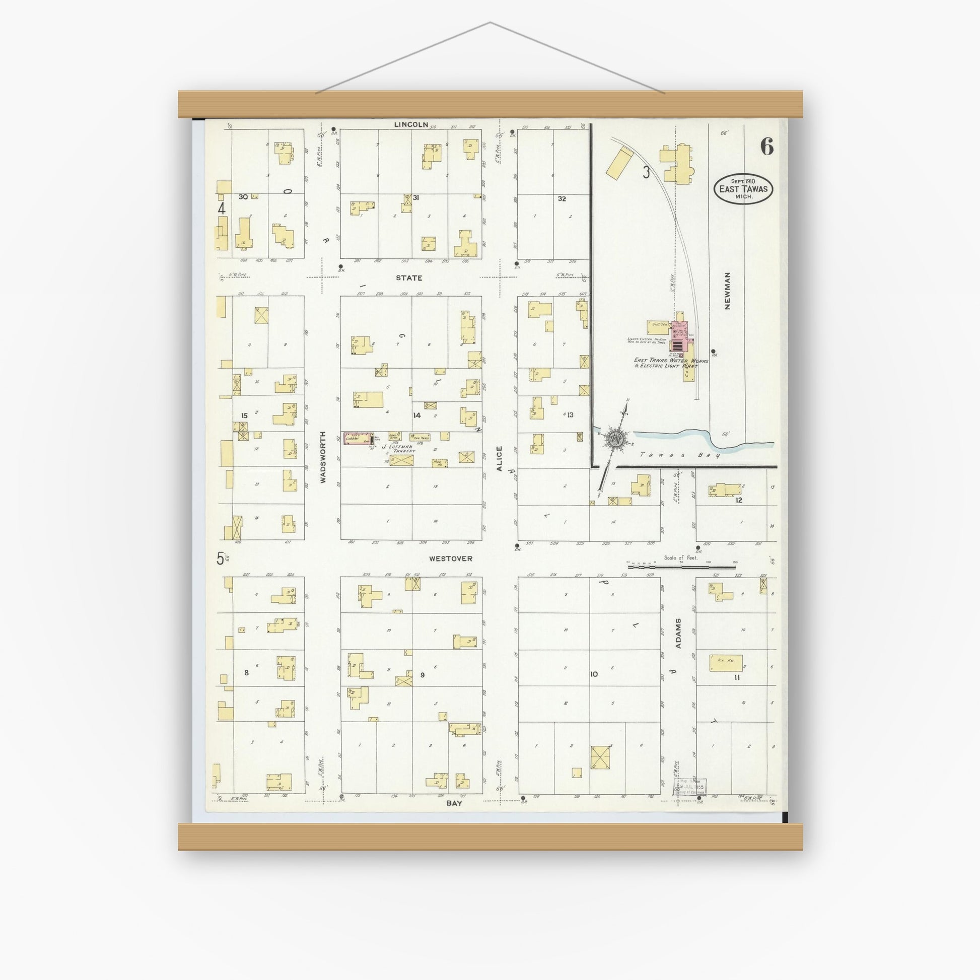 Old map wall art mockup — magnetic wood frame on white wall — Sanborn Fire Insurance Map from East Tawas, Iosco County, Michigan (1910), Sheet #0006