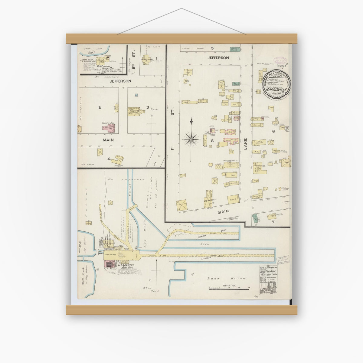 Old map wall art mockup — magnetic wood frame on white wall — Sanborn Fire Insurance Map from Harrisville, Alcona County, Michigan (1887), Sheet #0001