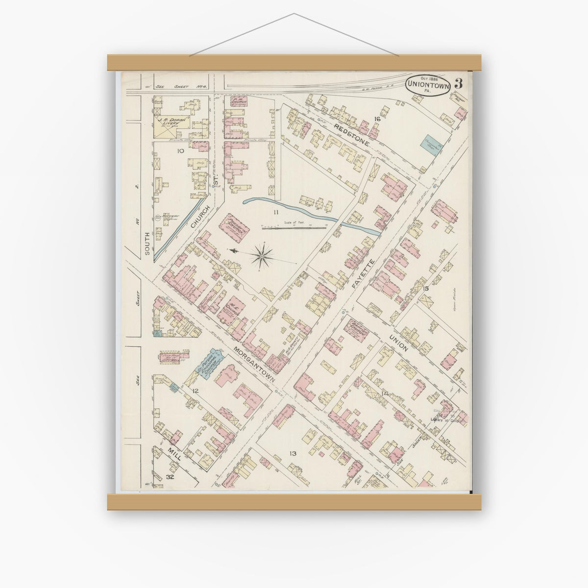Old map wall art mockup — magnetic wood frame on white wall — Sanborn Fire Insurance Map from Uniontown, Fayette County, Pennsylvania (1886), Sheet #0003