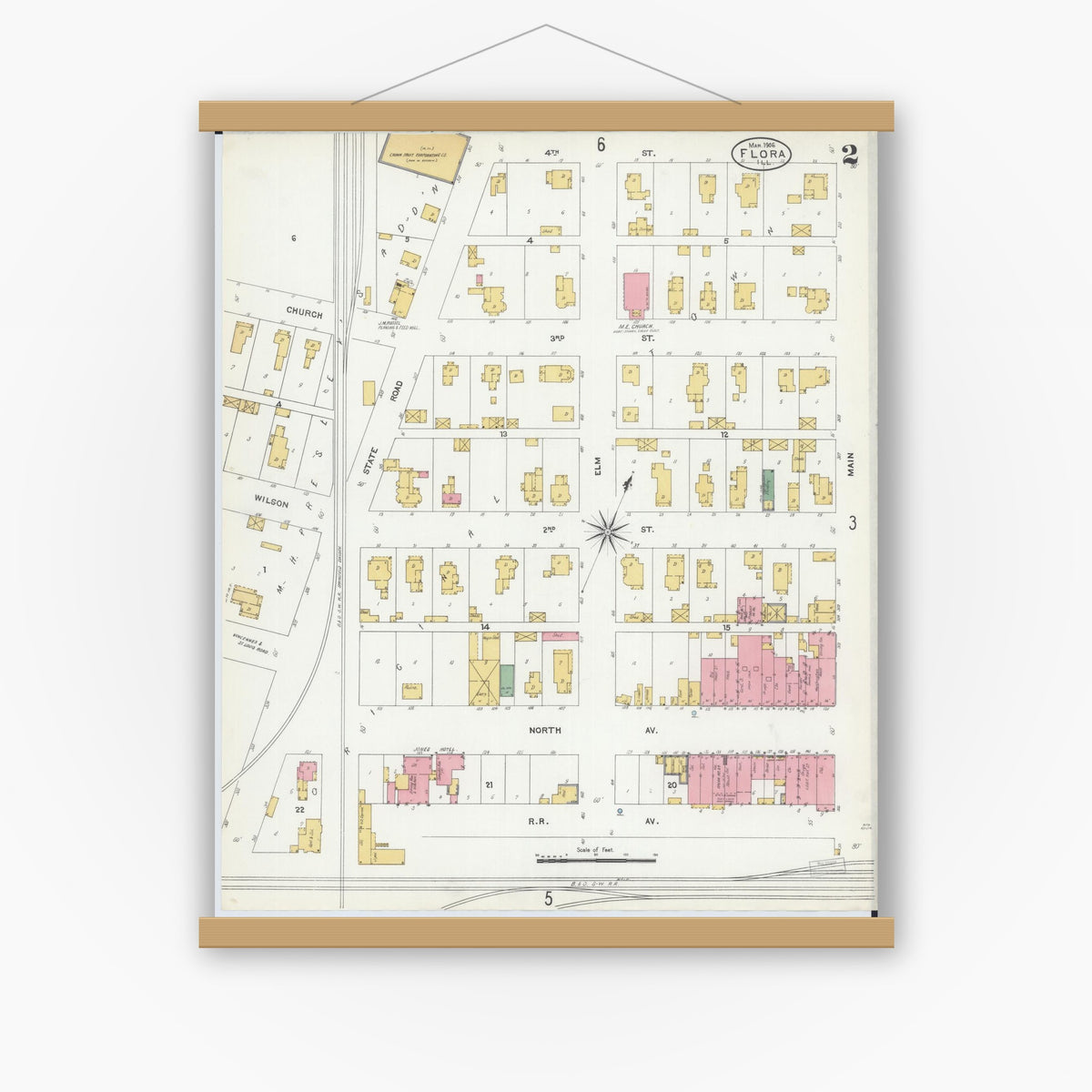 Old map wall art mockup — magnetic wood frame on white wall — Sanborn Fire Insurance Map from Flora, Clay County, Illinois (1906), Sheet #0002