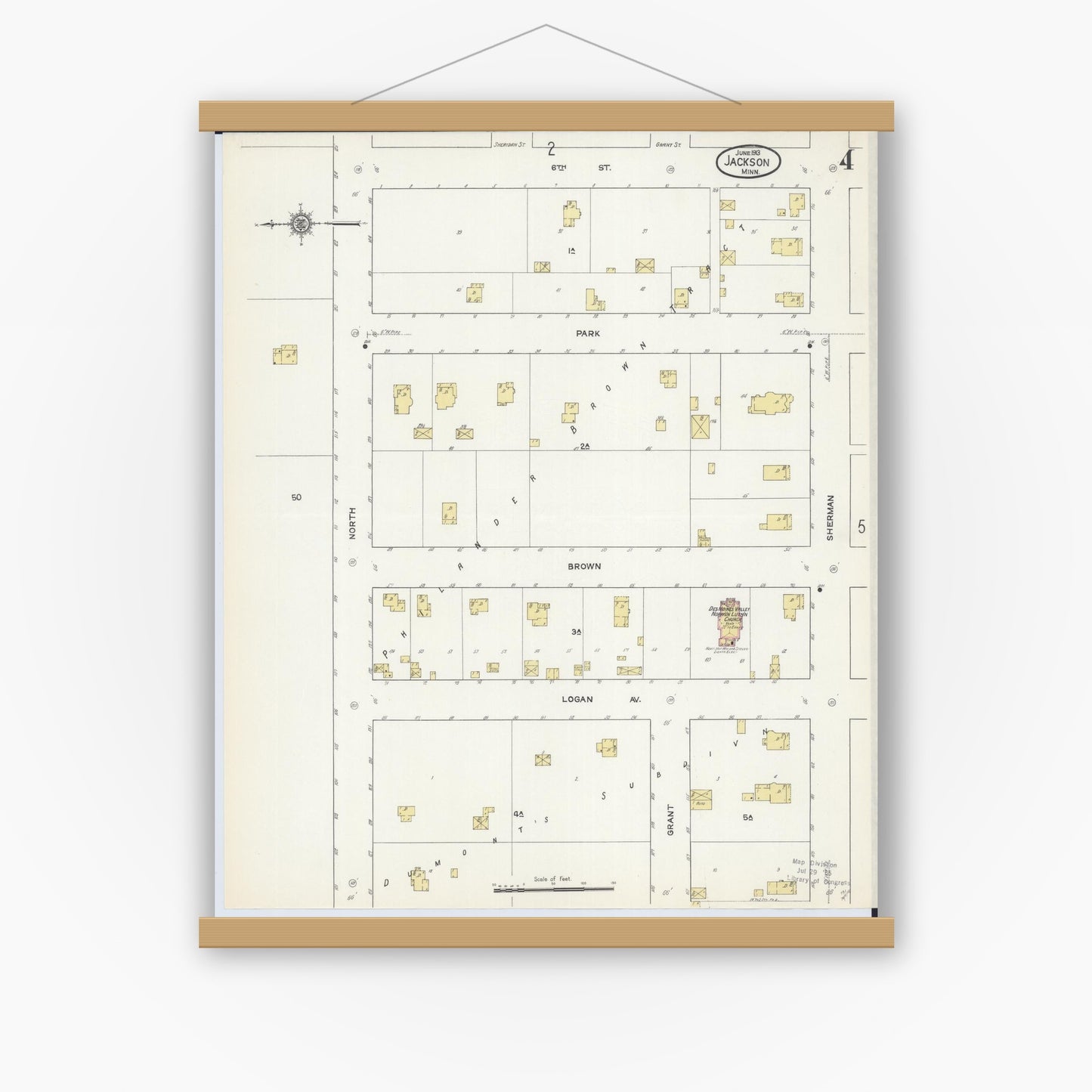 Old map wall art mockup — magnetic wood frame on white wall — Sanborn Fire Insurance Map from Jackson, Jackson County, Minnesota (1913), Sheet #0004