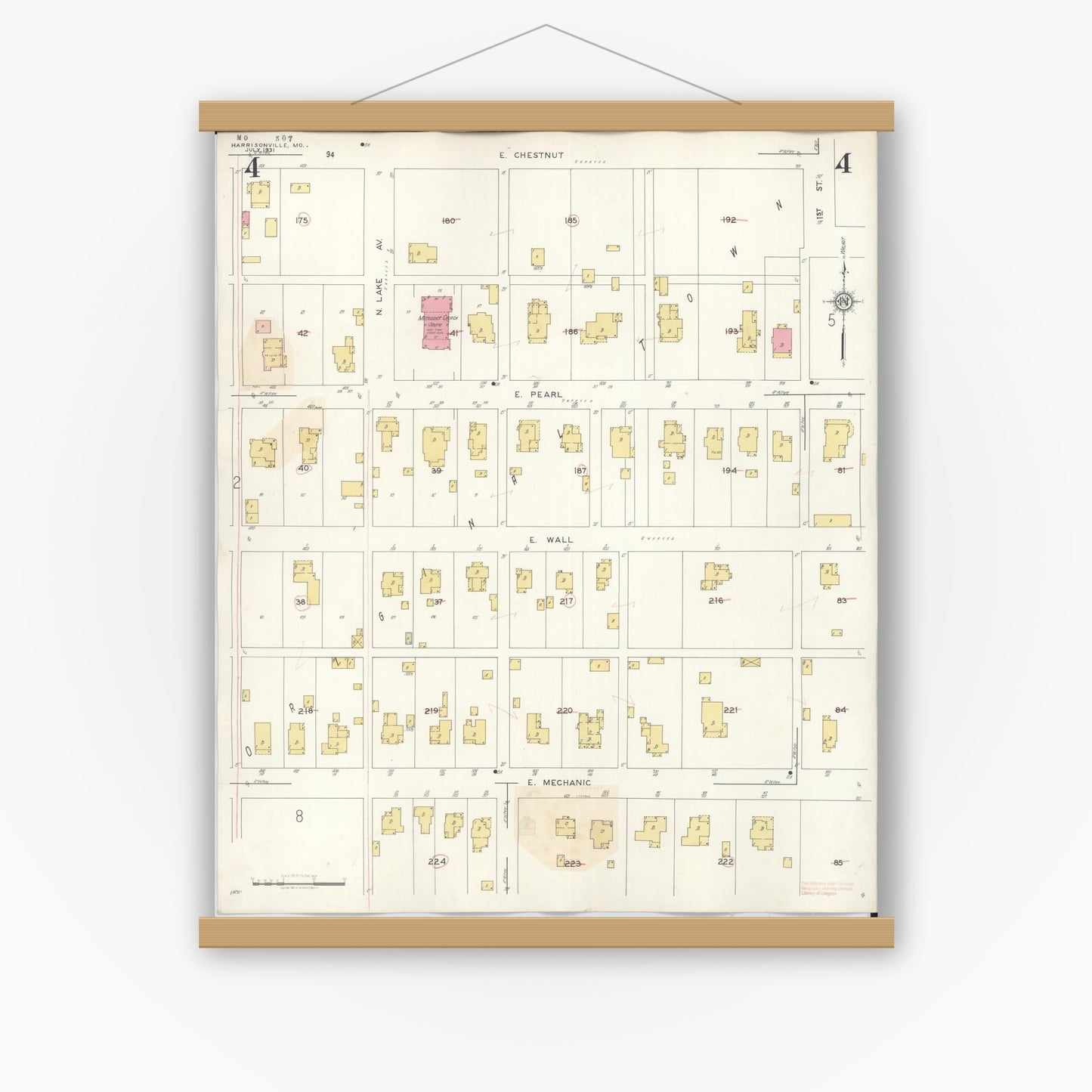 Old map wall art mockup — magnetic wood frame on white wall — Sanborn Fire Insurance Map from Harrisonville, Cass County, Missouri (1939), Sheet #0004
