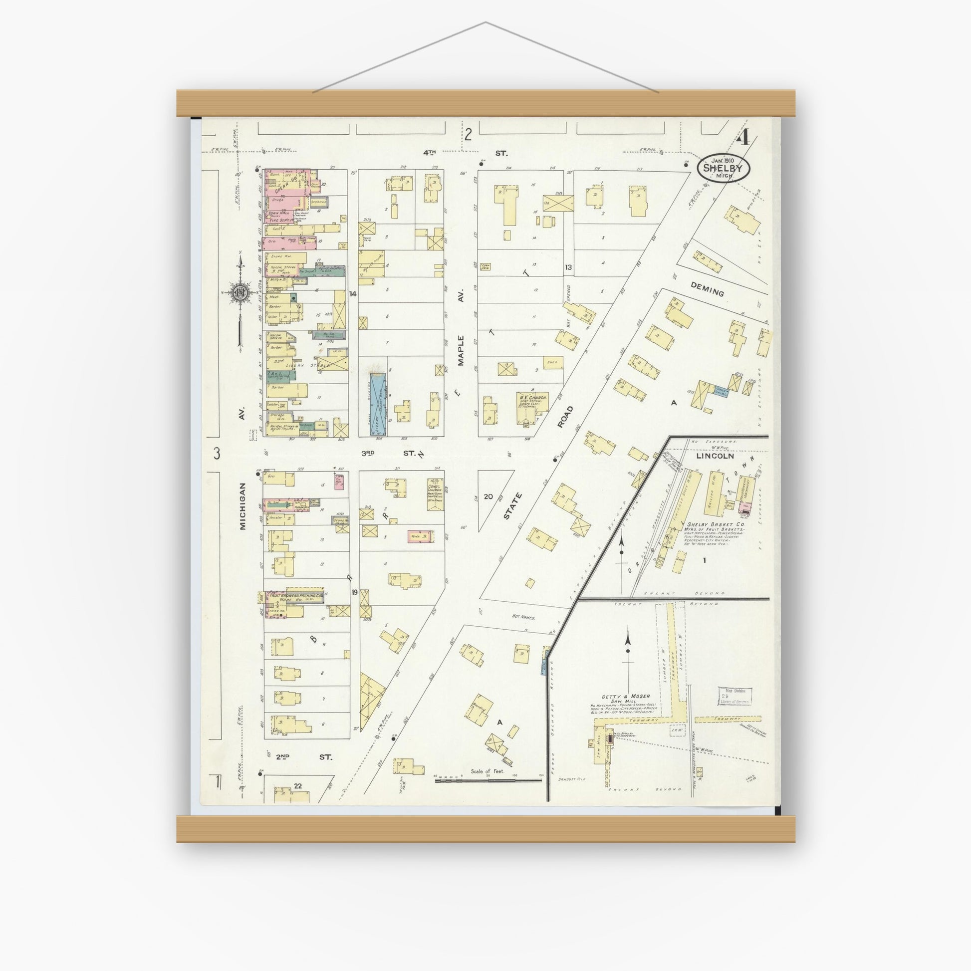 Old map wall art mockup — magnetic wood frame on white wall — Sanborn Fire Insurance Map from Shelby, Oceana County, Michigan (1910), Sheet #0004