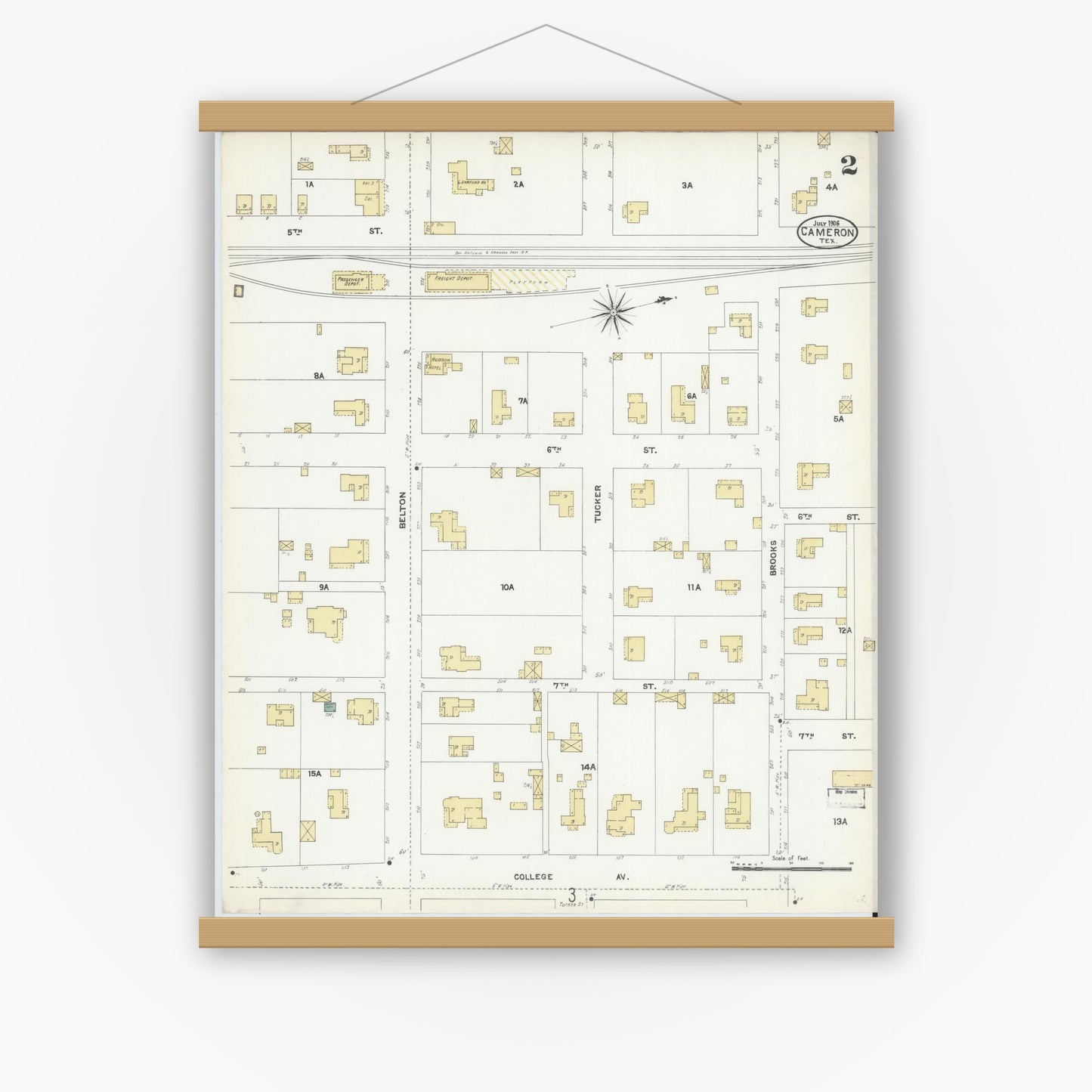 Old map wall art mockup — magnetic wood frame on white wall — Sanborn Fire Insurance Map from Cameron, Milam County, Texas (1906), Sheet #0002