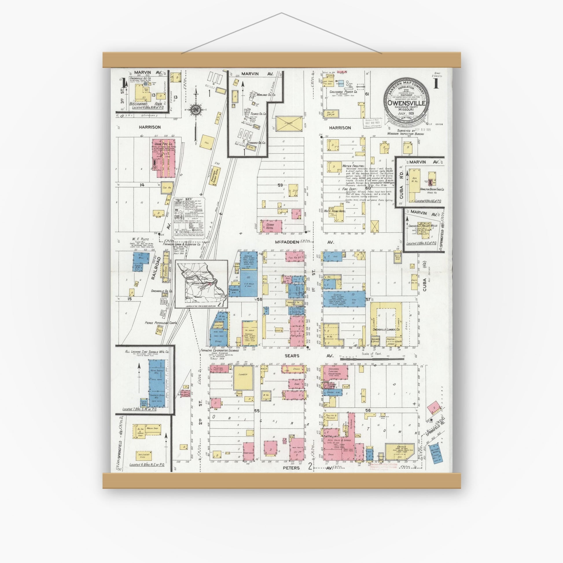 Old map wall art mockup — magnetic wood frame on white wall — Sanborn Fire Insurance Map from Owensville, Gasconade County, Missouri (1929) - Complete Map Set