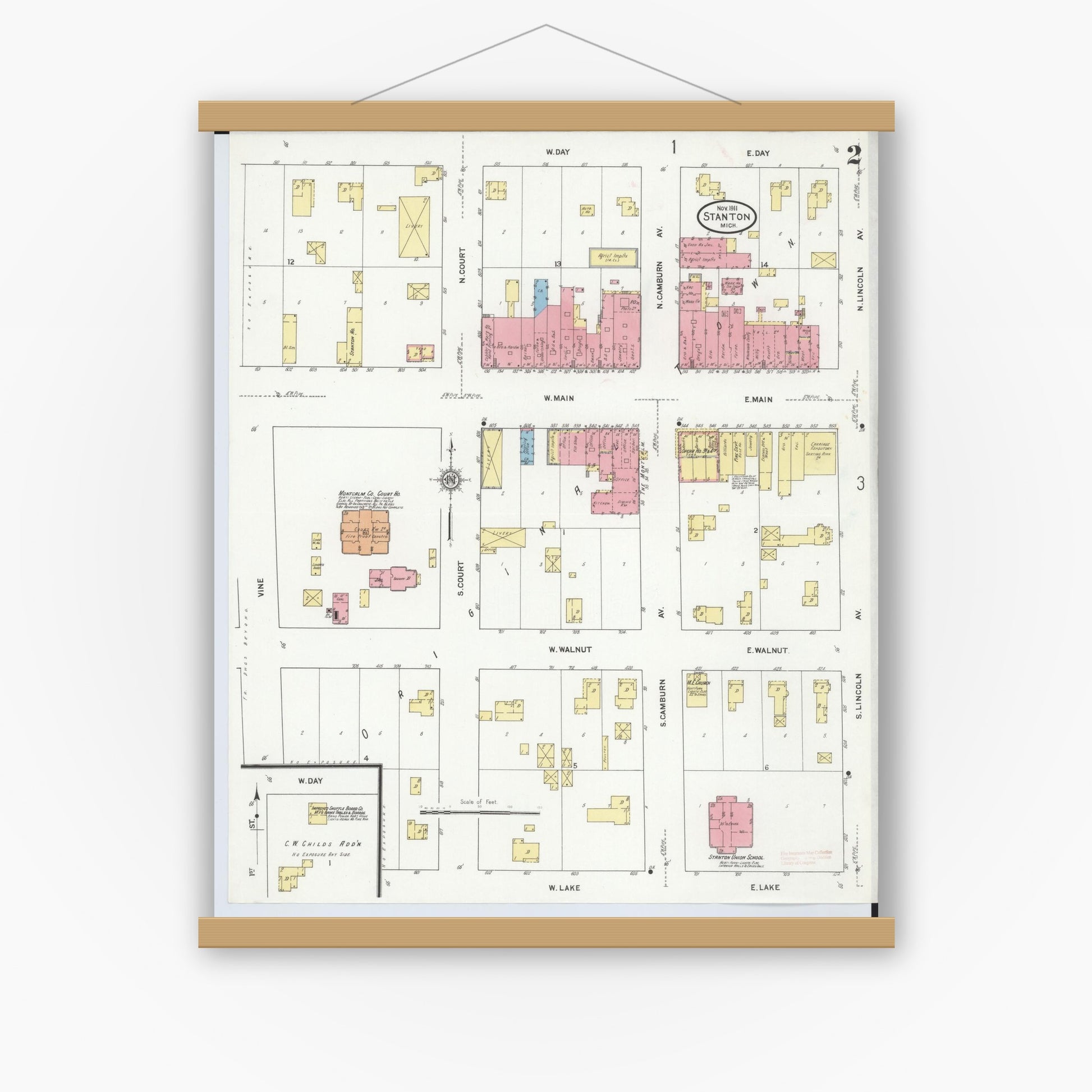 Old map wall art mockup — magnetic wood frame on white wall — Sanborn Fire Insurance Map from Stanton, Montcalm County, Michigan (1911), Sheet #0002