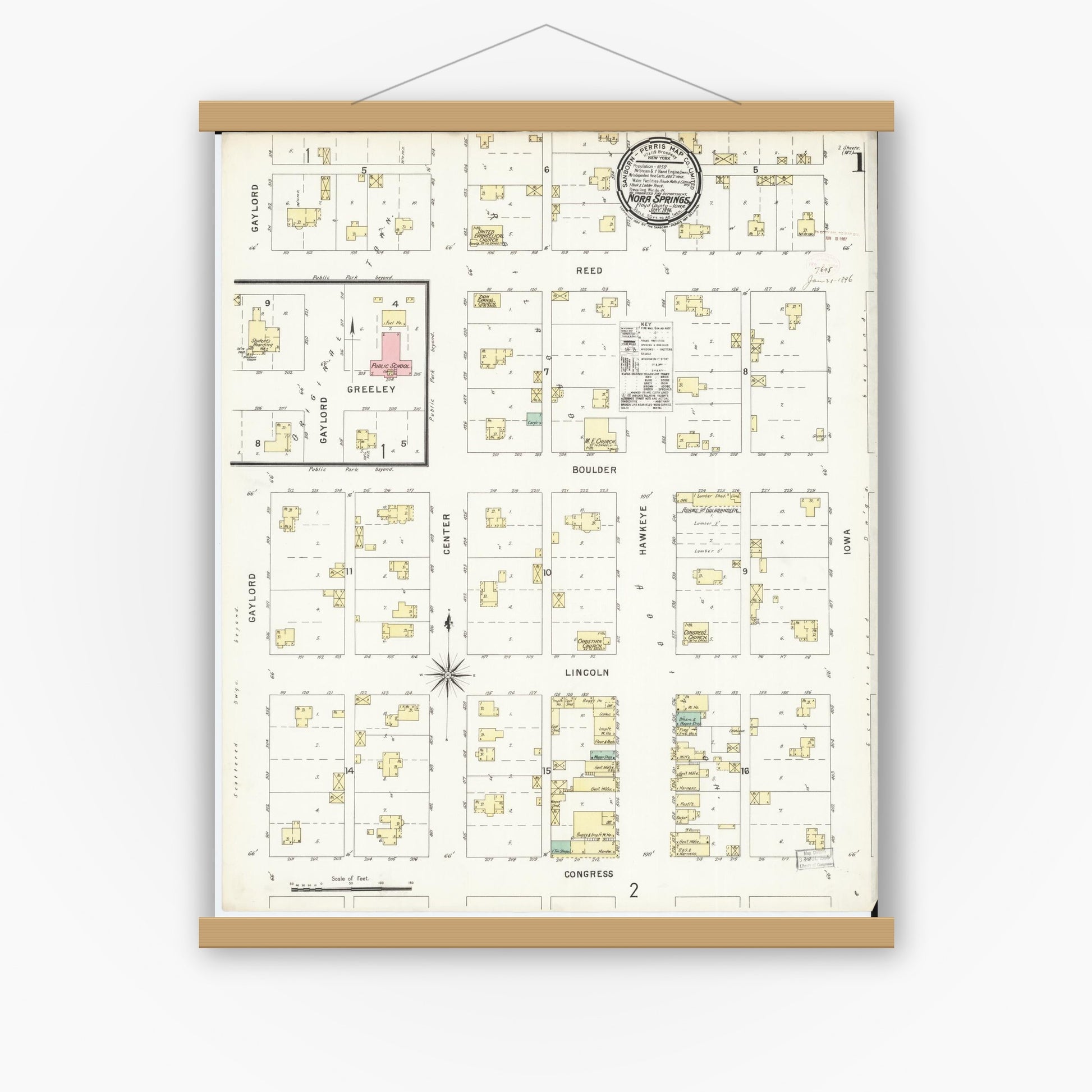 Old map wall art mockup — magnetic wood frame on white wall — Sanborn Fire Insurance Map from Nora Springs, Floyd County, Iowa (1896) â€” Complete Set
