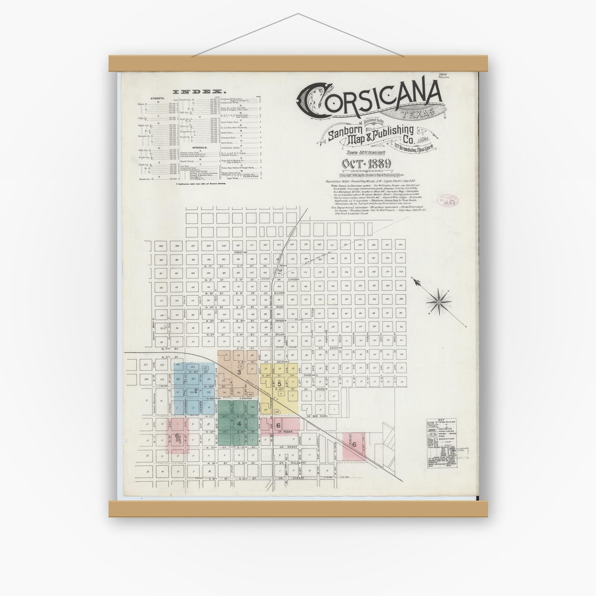 Old map wall art mockup — magnetic wood frame on white wall — Sanborn Fire Insurance Map from Corsicana, Navarro County, Texas (1889) - Complete Map Set
