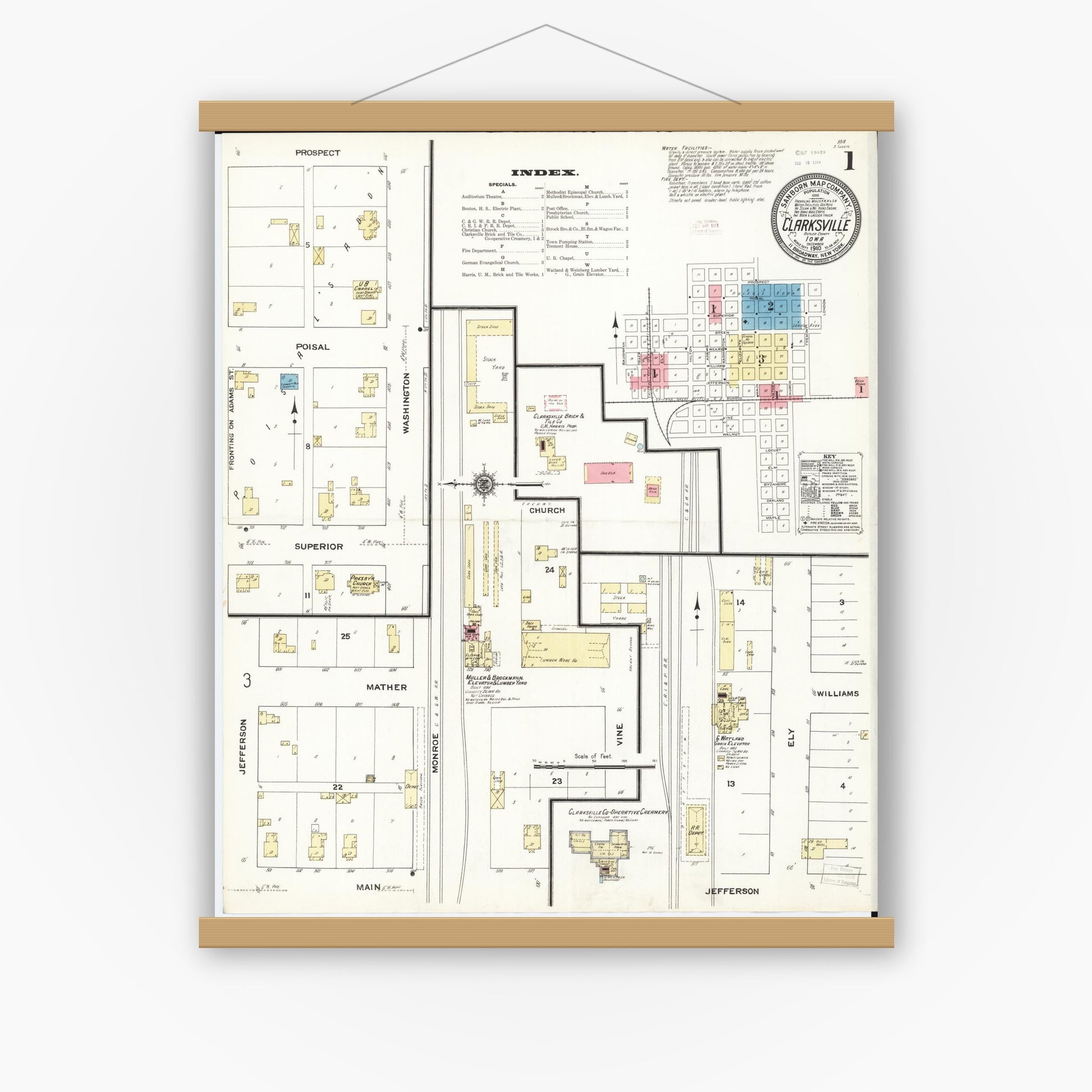 Old map wall art mockup — magnetic wood frame on white wall — Sanborn Fire Insurance Map from Clarksville, Butler County, Iowa (1910) â€” Complete Set