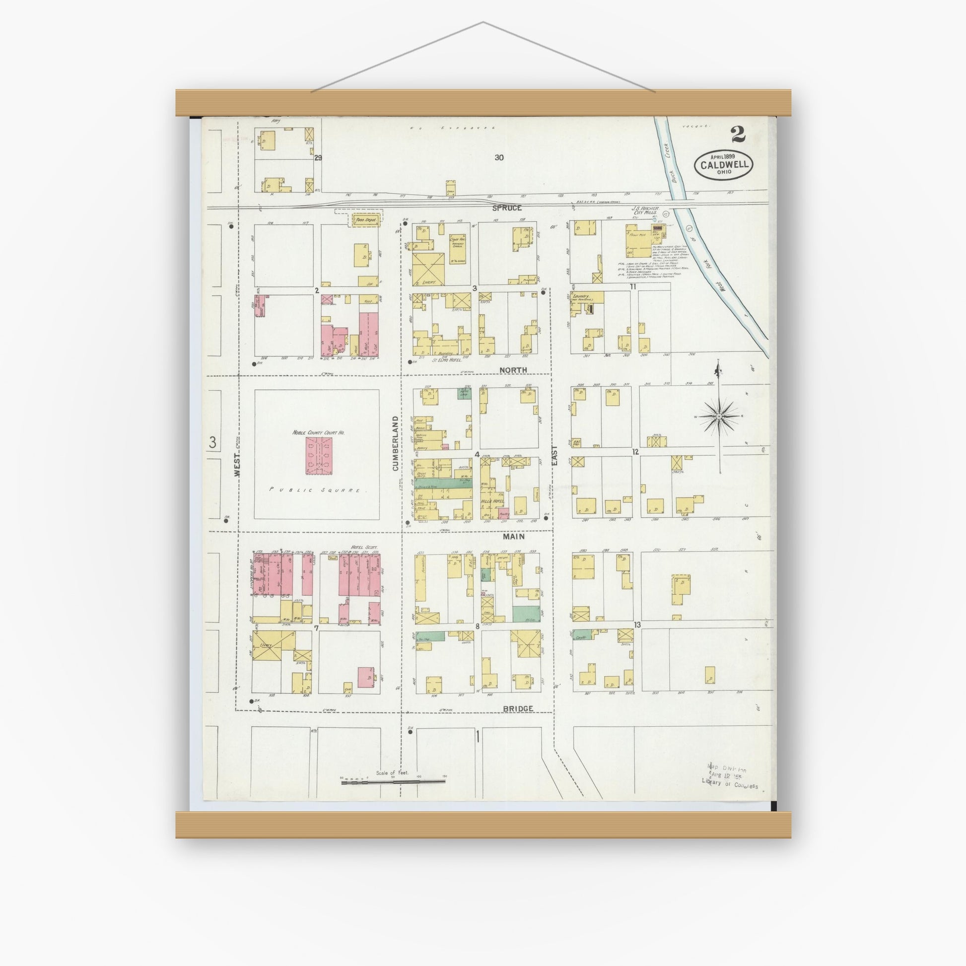 Old map wall art mockup — magnetic wood frame on white wall — Sanborn Fire Insurance Map from Caldwell, Noble County, Ohio (1899), Sheet #0002
