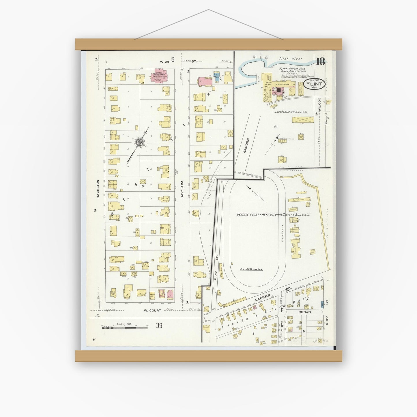 Old map wall art mockup — magnetic wood frame on white wall — Sanborn Fire Insurance Map from Flint, Genesee County, Michigan (1909), Sheet #0018