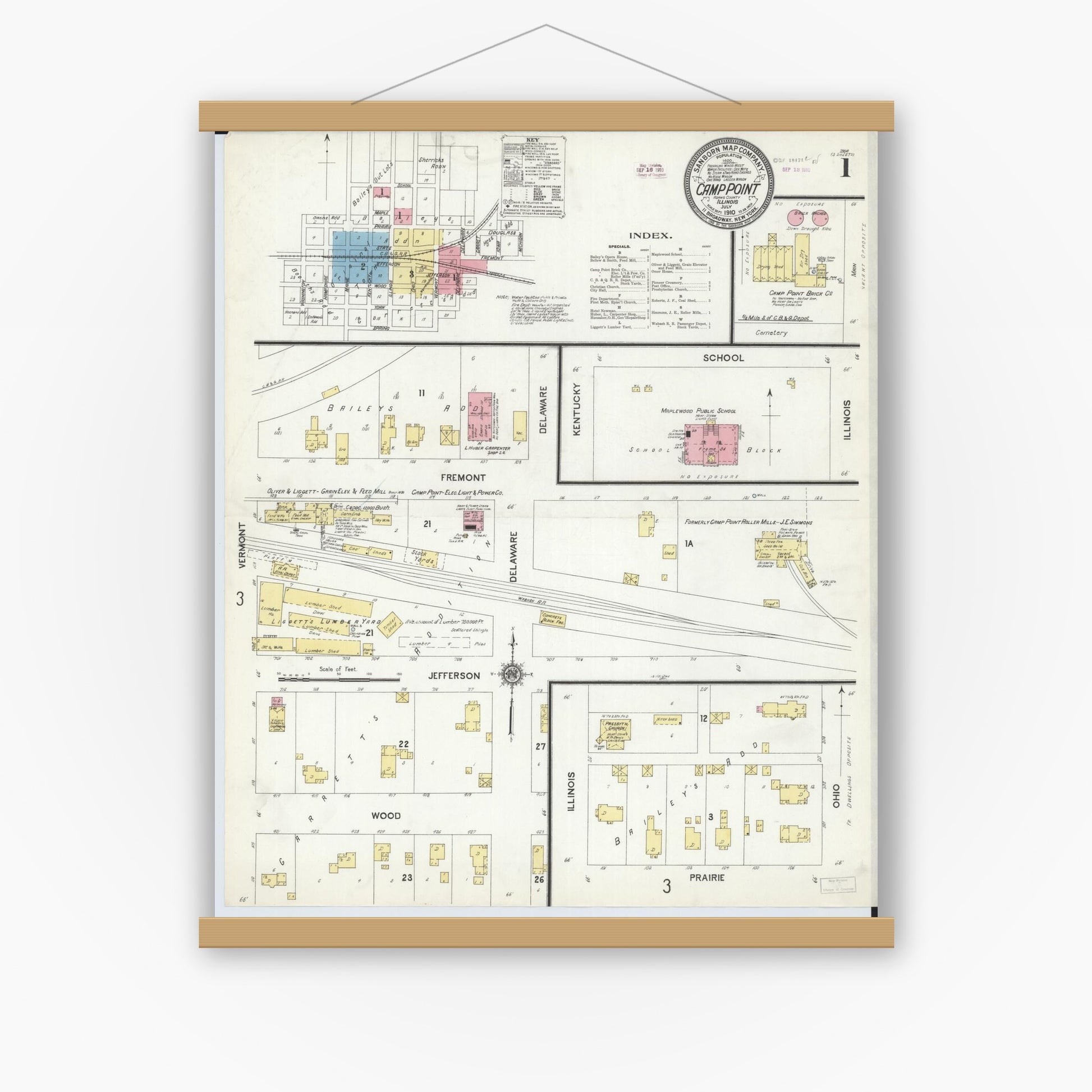 Old map wall art mockup — magnetic wood frame on white wall — Sanborn Fire Insurance Map from Camp Point, Adams County, Illinois (1910), Sheet #0001