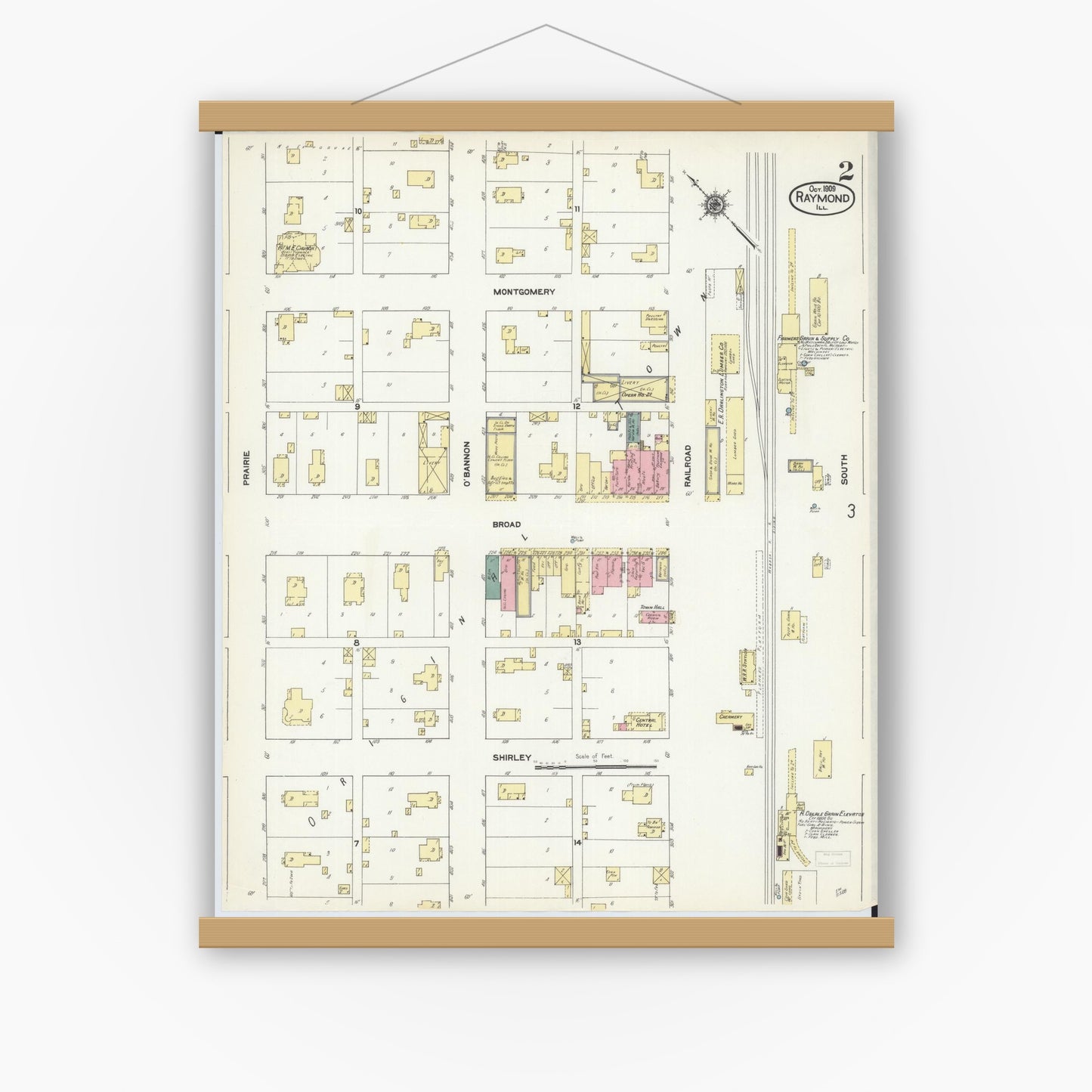 Old map wall art mockup — magnetic wood frame on white wall — Sanborn Fire Insurance Map from Raymond, Montgomery County, Illinois (1909), Sheet #0002