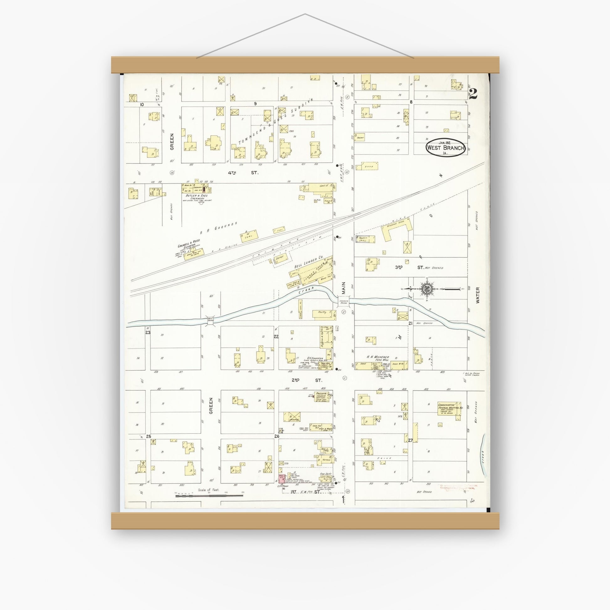 Old map wall art mockup — magnetic wood frame on white wall — Sanborn Fire Insurance Map from West Branch, Cedar County, Iowa (1912), Sheet #0002